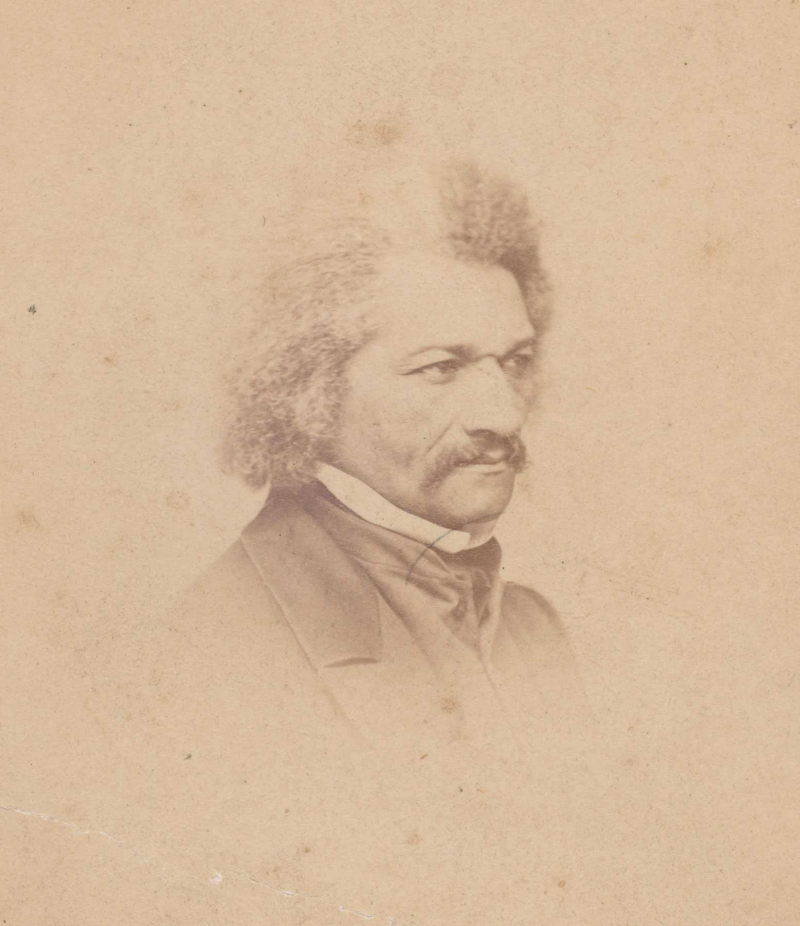 Sepia toned, photograph of Frederick Douglass.