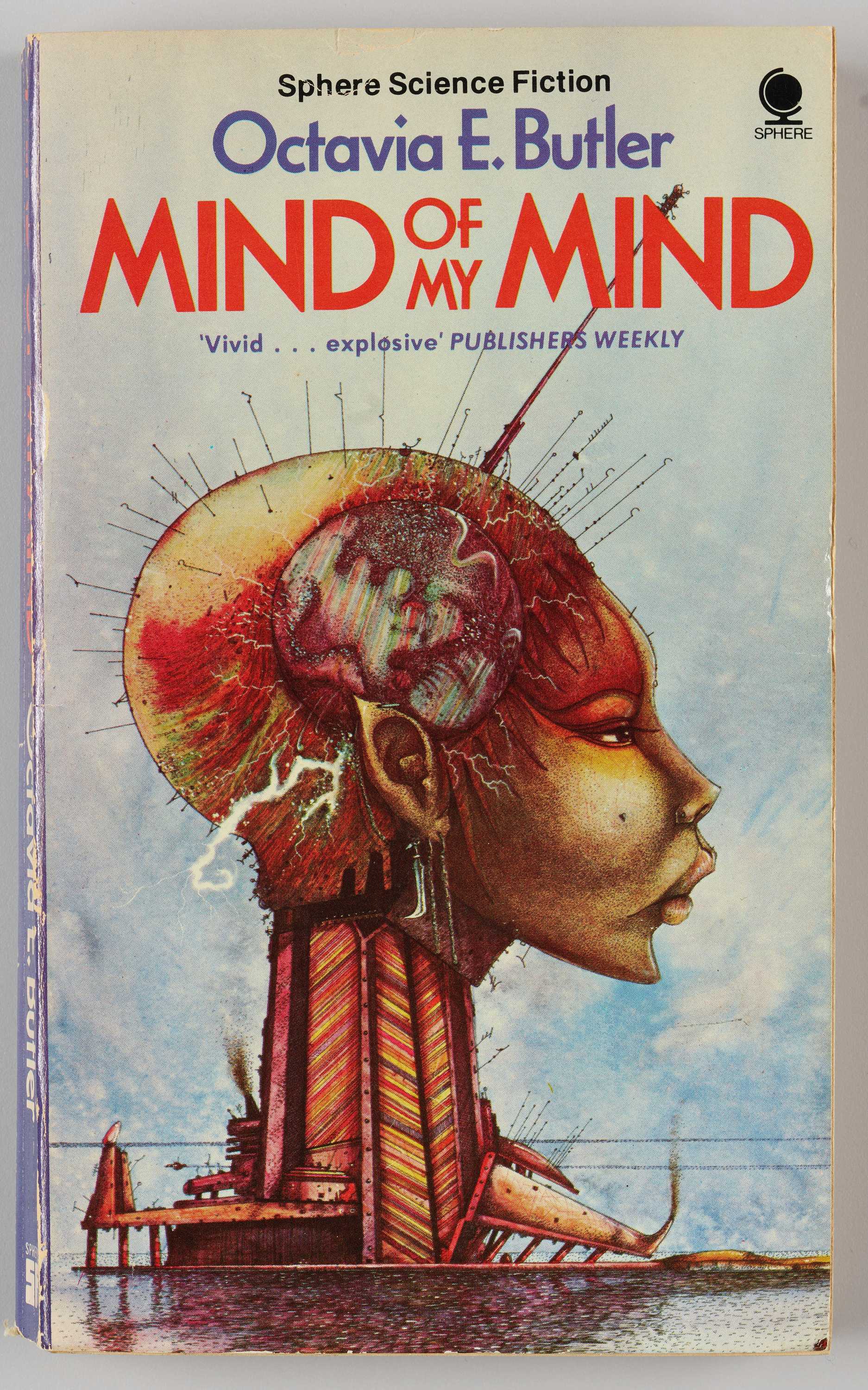 Cover of Octavia E. Butler's 'Mind of My Mind", which has an illustration of mechanical-looking woman.