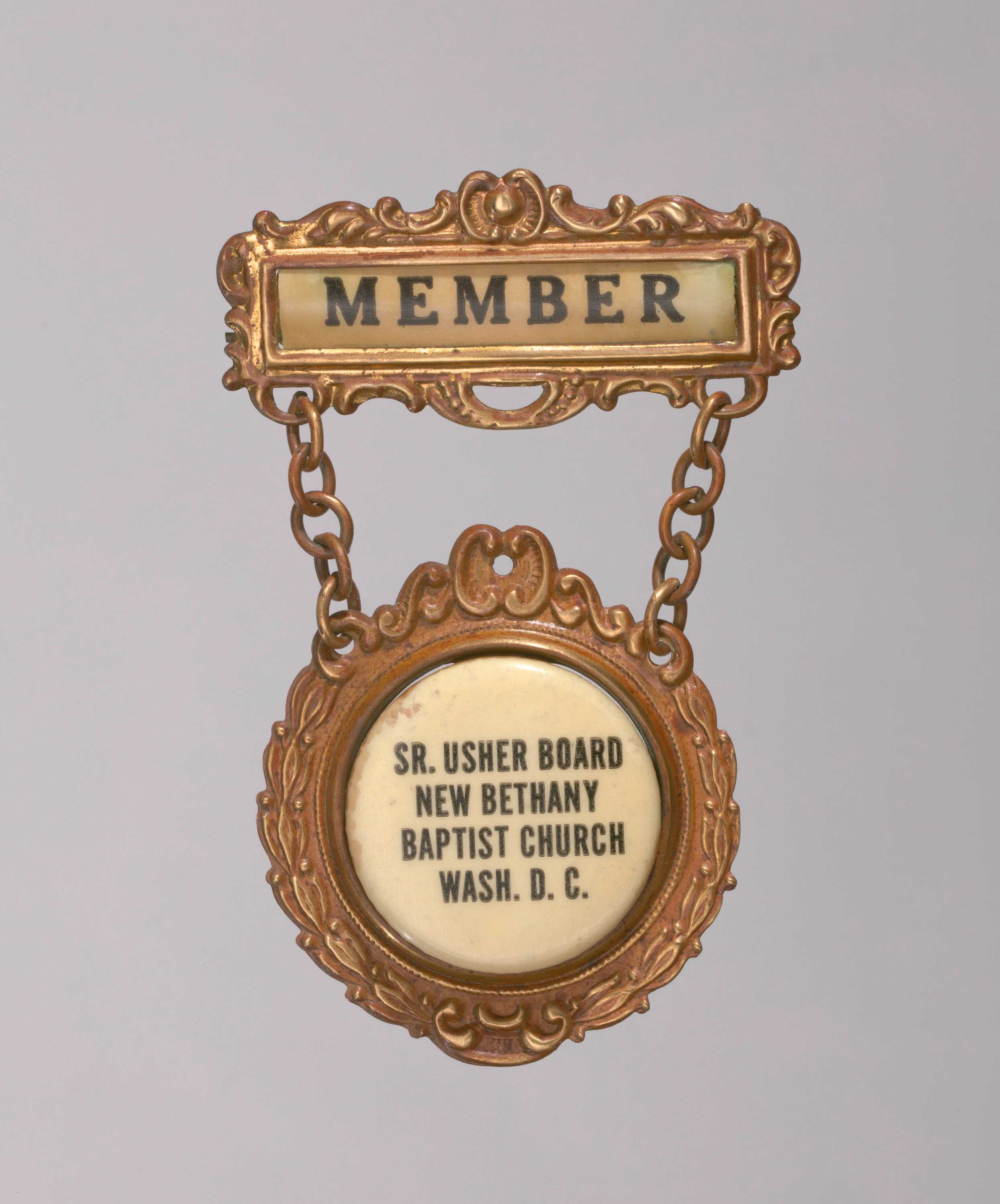 This is a faux gold usher badge was worn by Ruby Penn, a onetime member on the usher board at New Bethany Baptist Church in Washington, D.C.