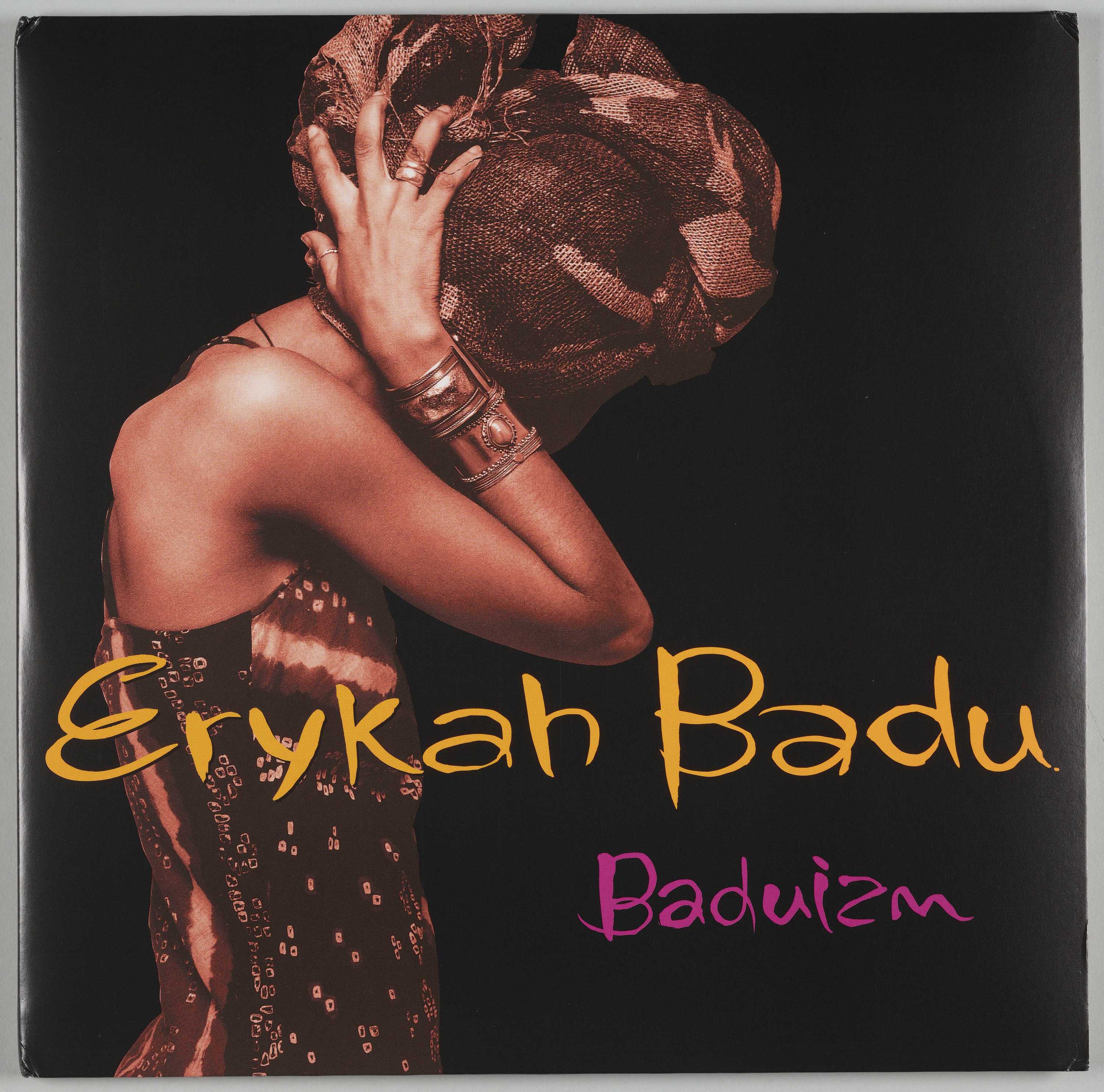 The album cover for Baduizm featuring her a side view portrait of Erykah Badu and vibrant typography.
