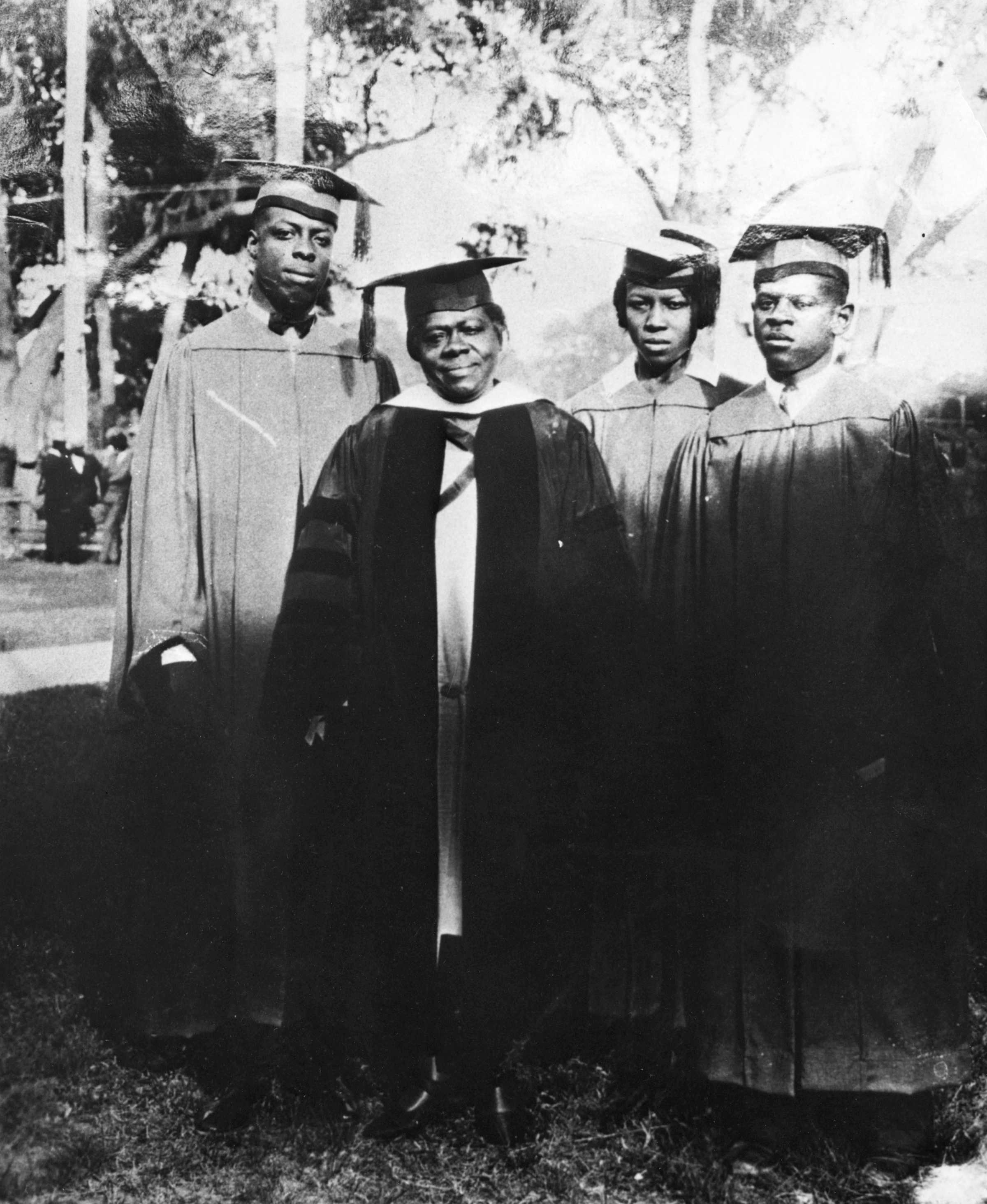 Photograph of Mary McLeod Bethune with graduates of the Daytona-Cookman Collegiate Institute