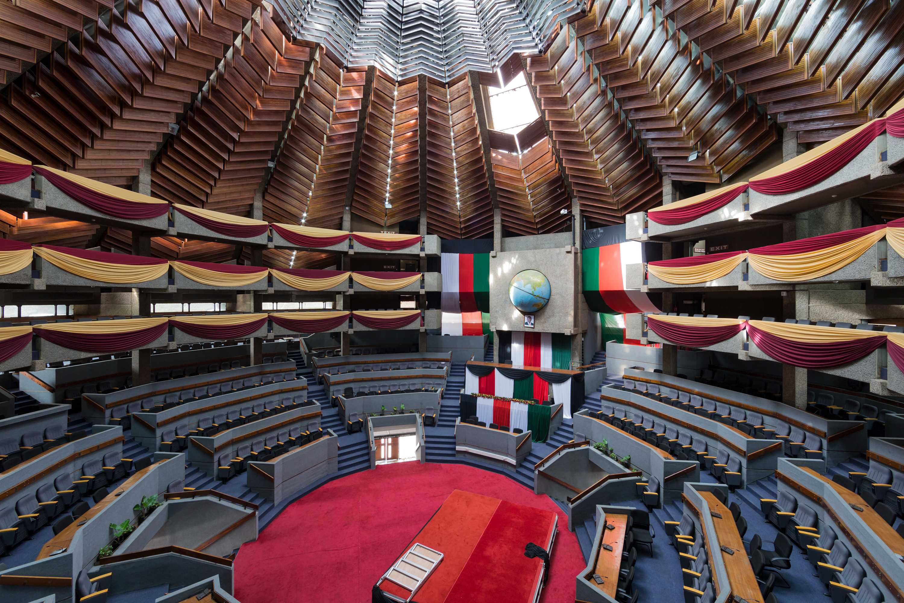 A modern, circular auditorium with a domed cieling in the Kenyatta International Conference Centre.