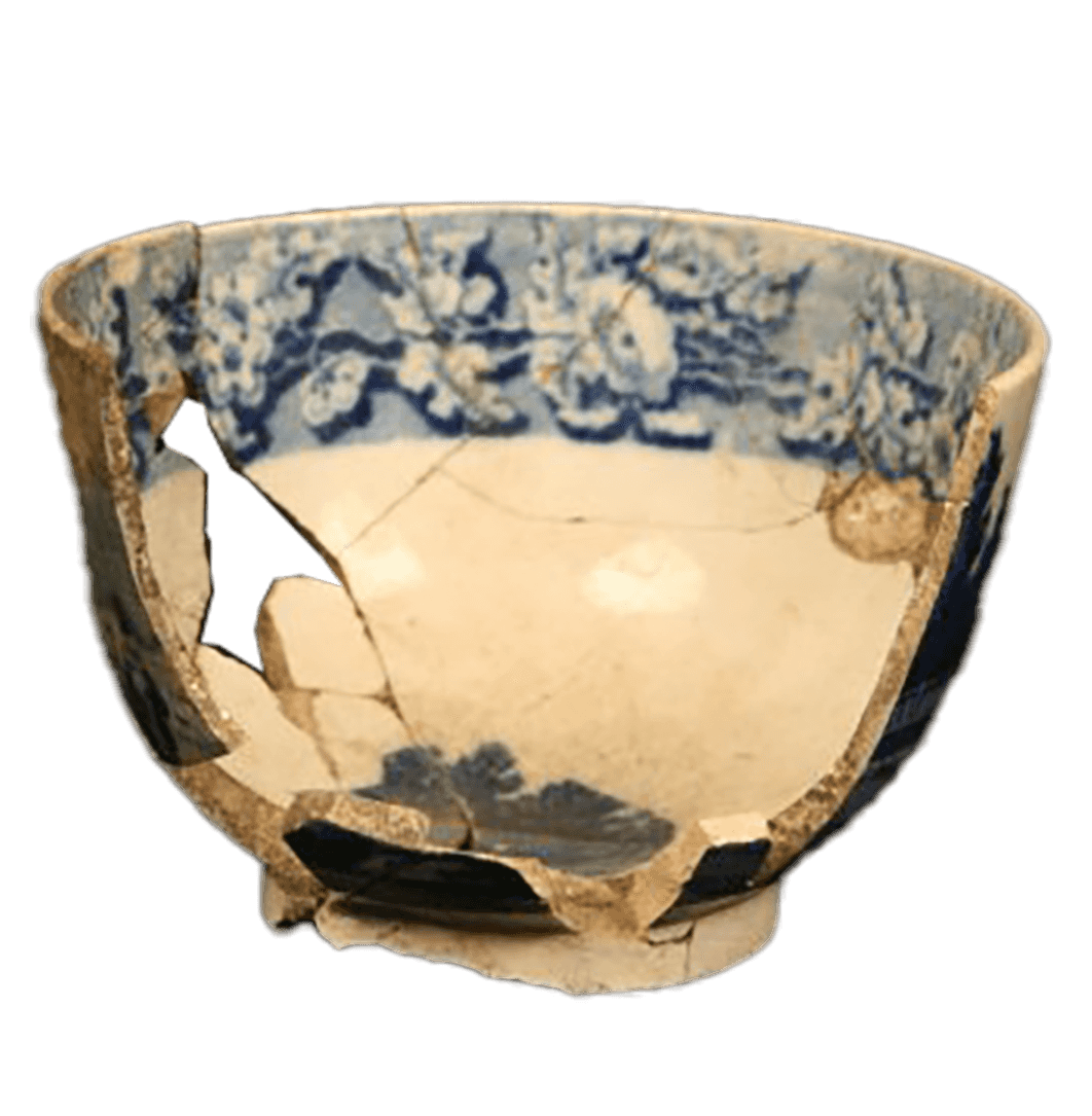 Photograph of ceramic cup and two shards