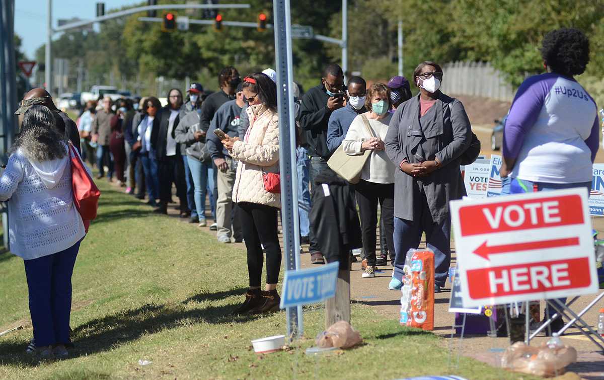 People waiting in line to vote