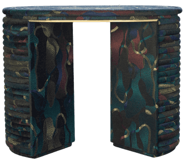 Upholstered stool with curved legs, wrapped in multicolored patterned fabric and featuring a rounded top and brass support.