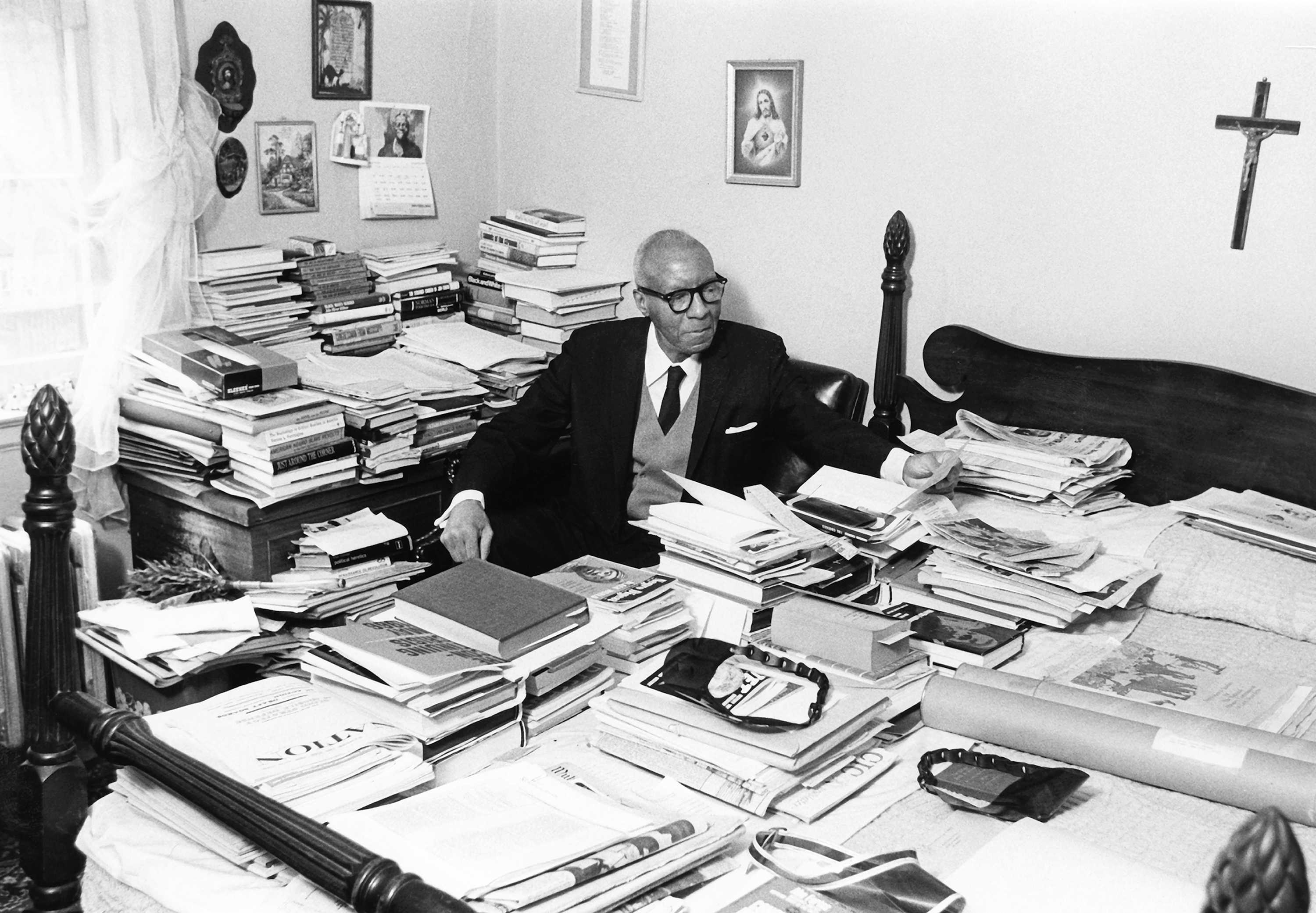 Black and white photograph of A. Philip Randolph in his apartment