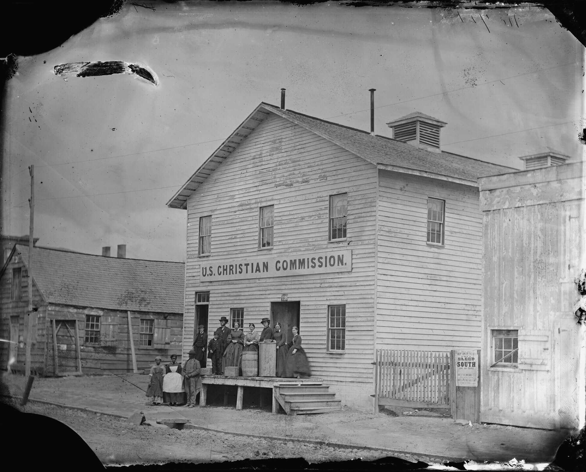 Photograph of women in front of a U.S. Christian Commission building