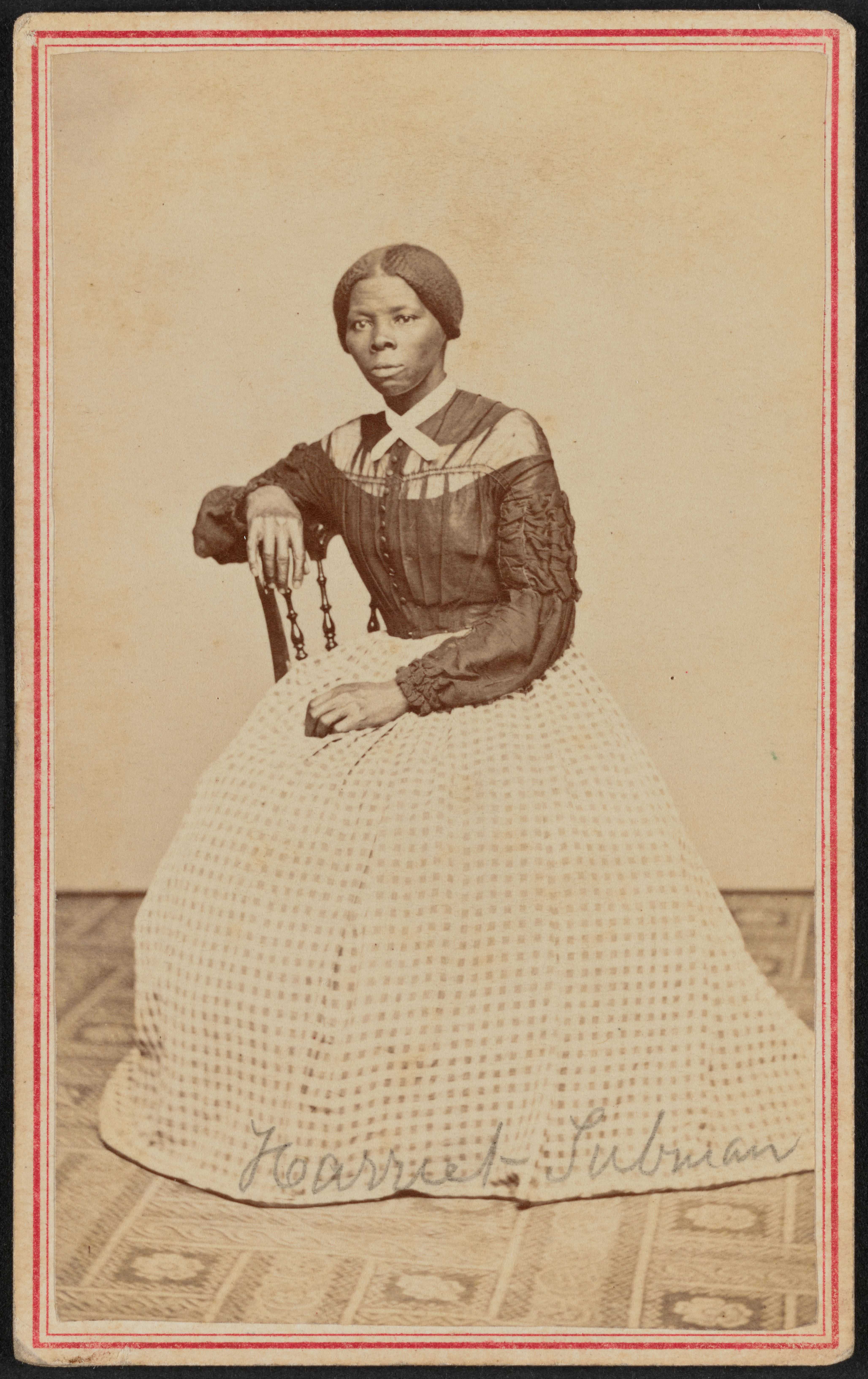 A carte-de-visite of Harriet Tubman seated in an interior room. She is positioned slightly turned to the right and gazes off camera.