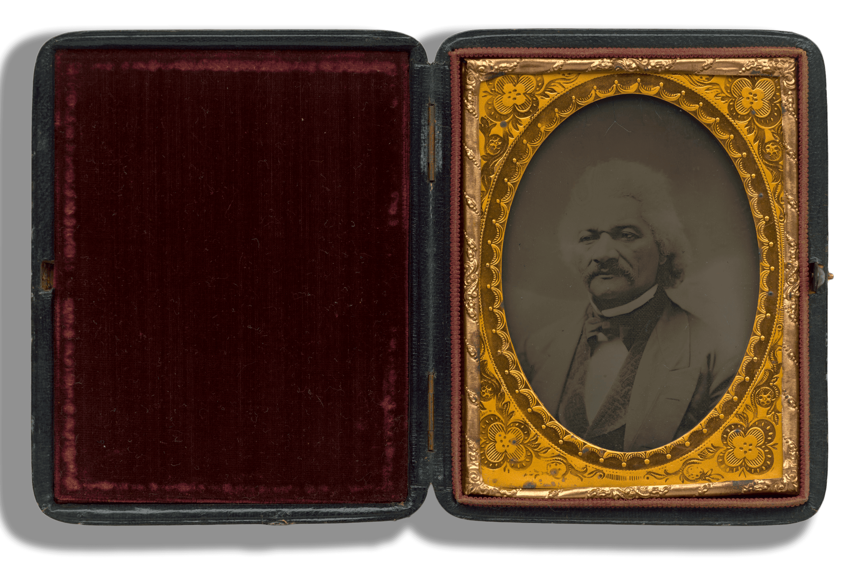 A pocket size ambrotype of Frederick Douglass in a gold frame. Douglass is on the right side.