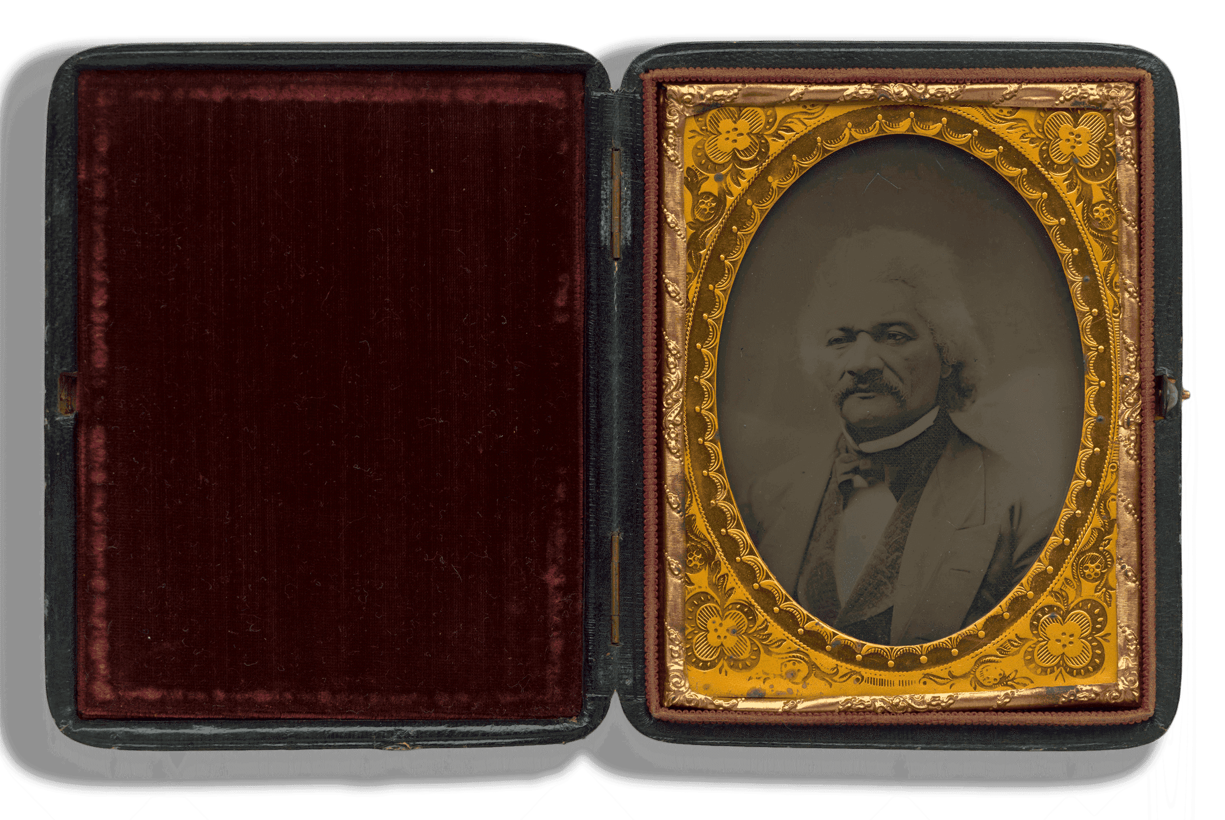 A pocket size ambrotype of Frederick Douglass in a gold frame. Douglass is on the right side.