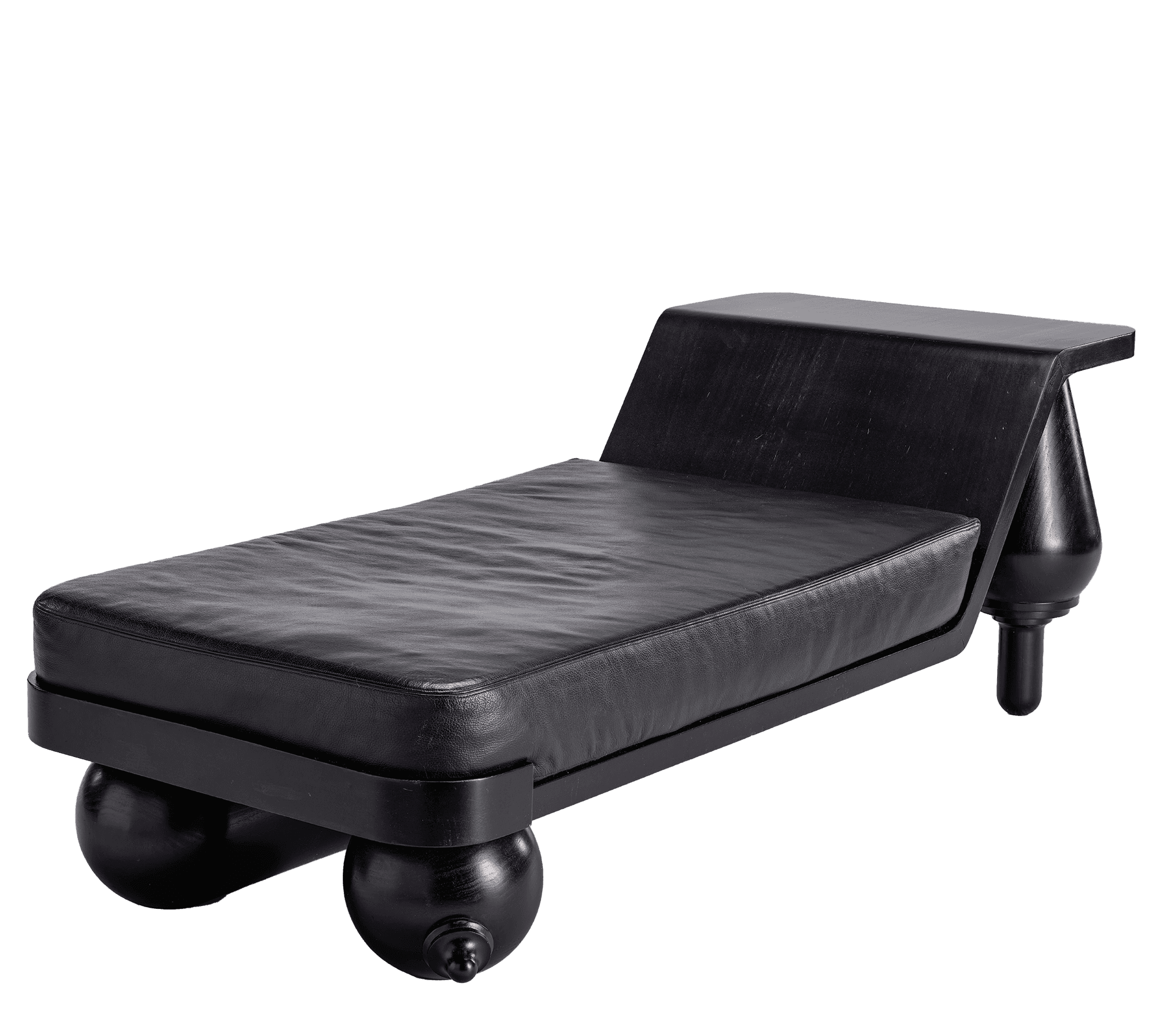 Black leather chaise lounge with a low backrest and rounded wooden legs.