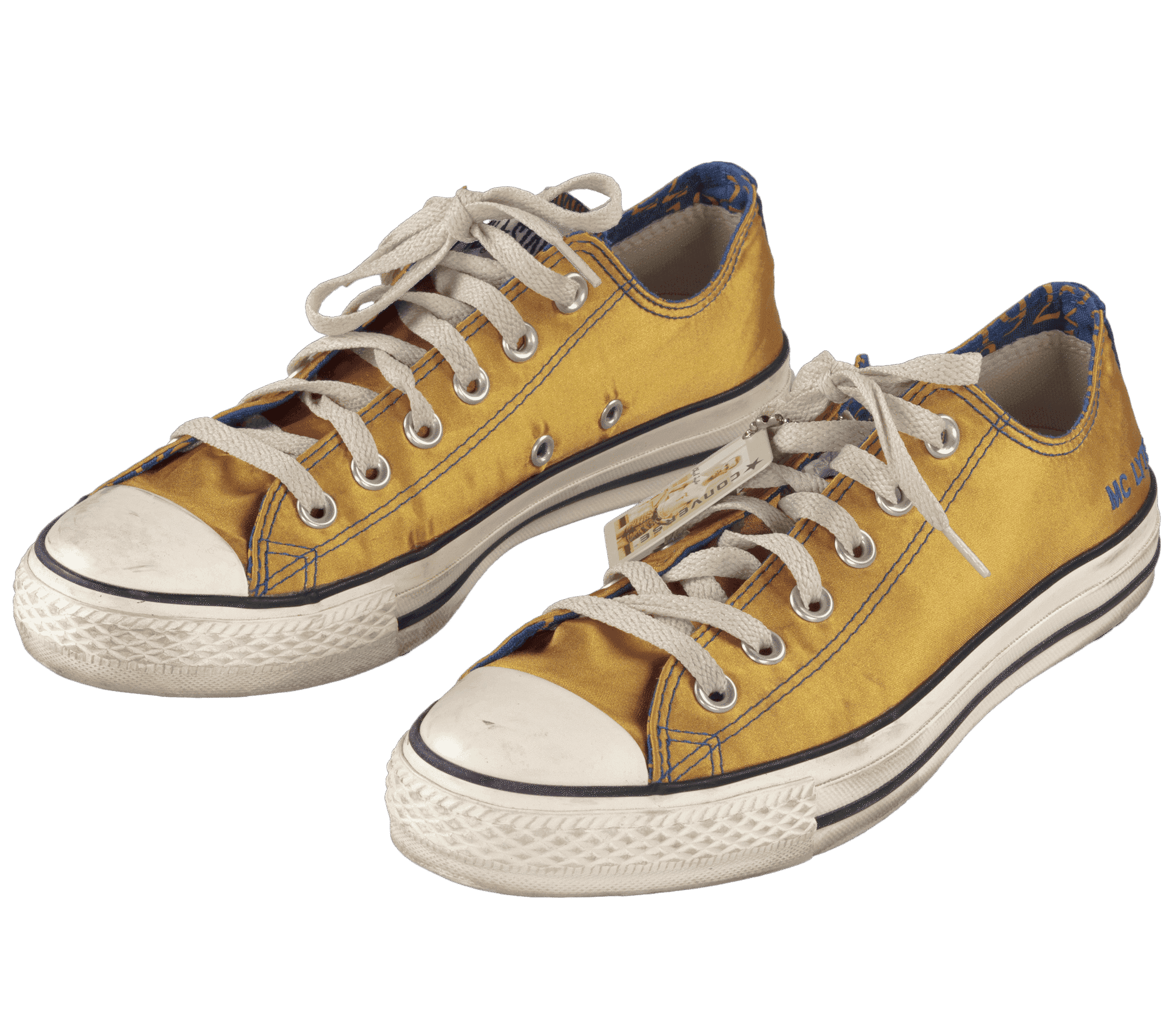 A pair of gold and blue satin Converse sneakers customized for Sigma Gamma Rho sorority member MC Lyte.