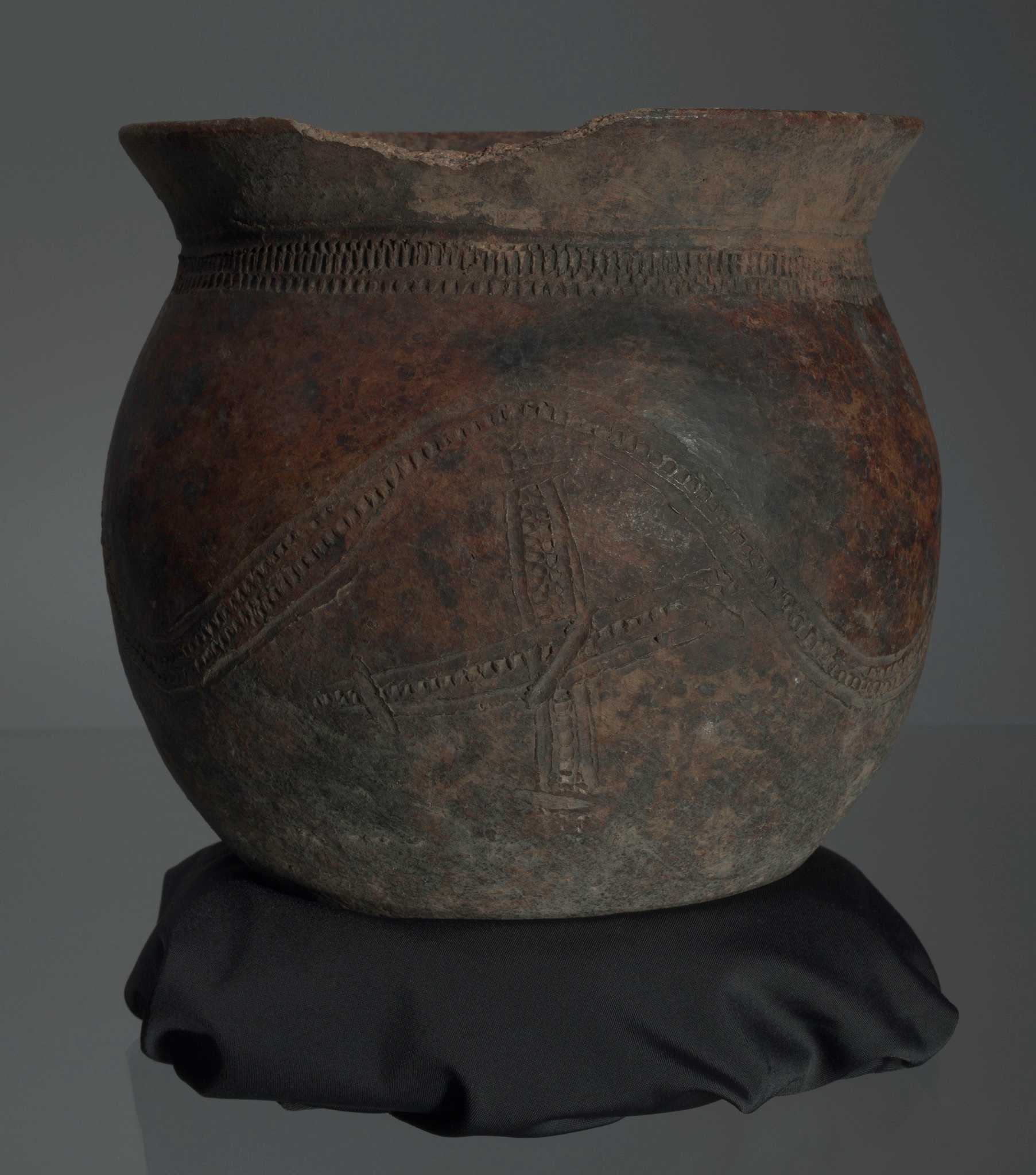Photograph of African Pottery with Cosmogram markings