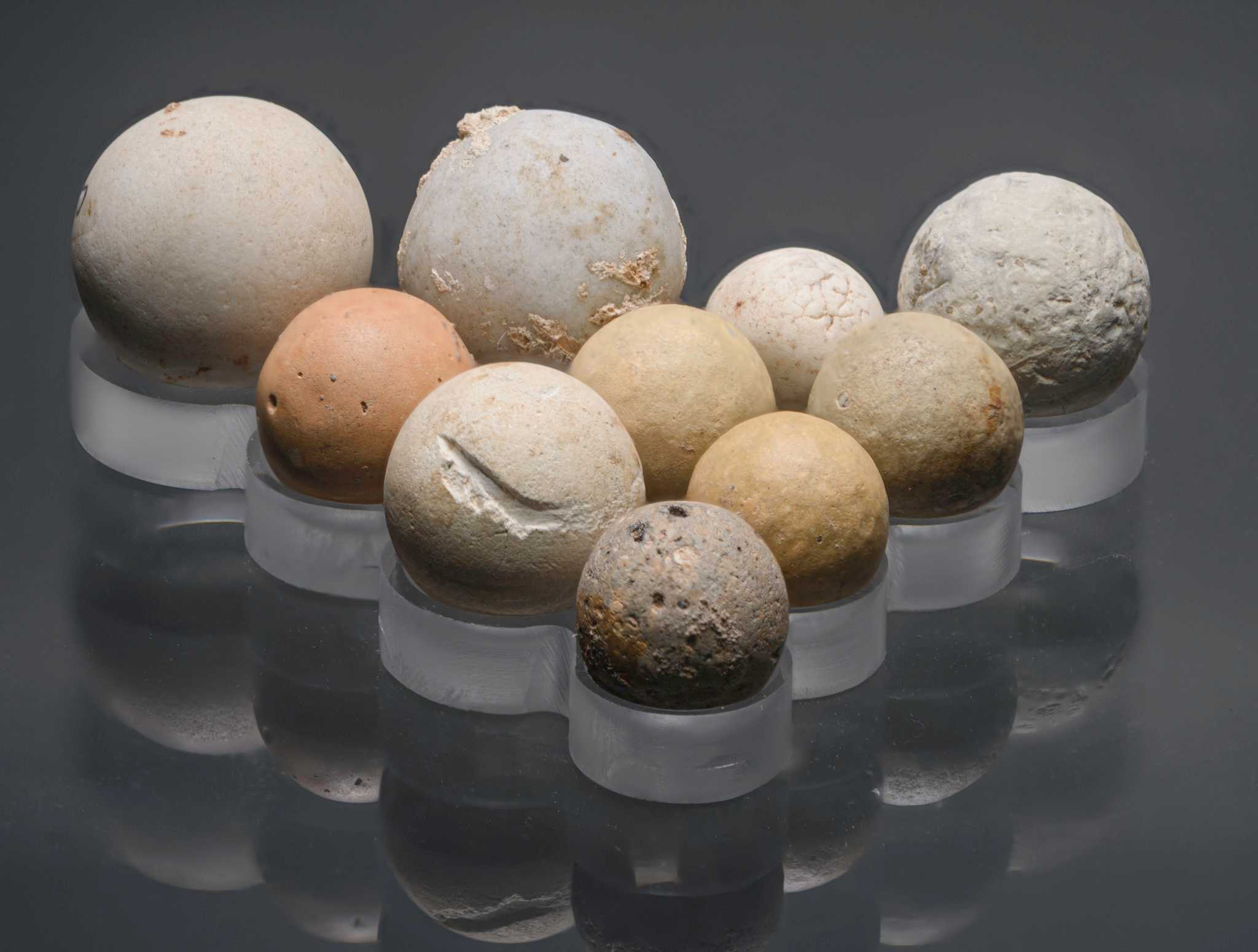 Photograph of ten marbles