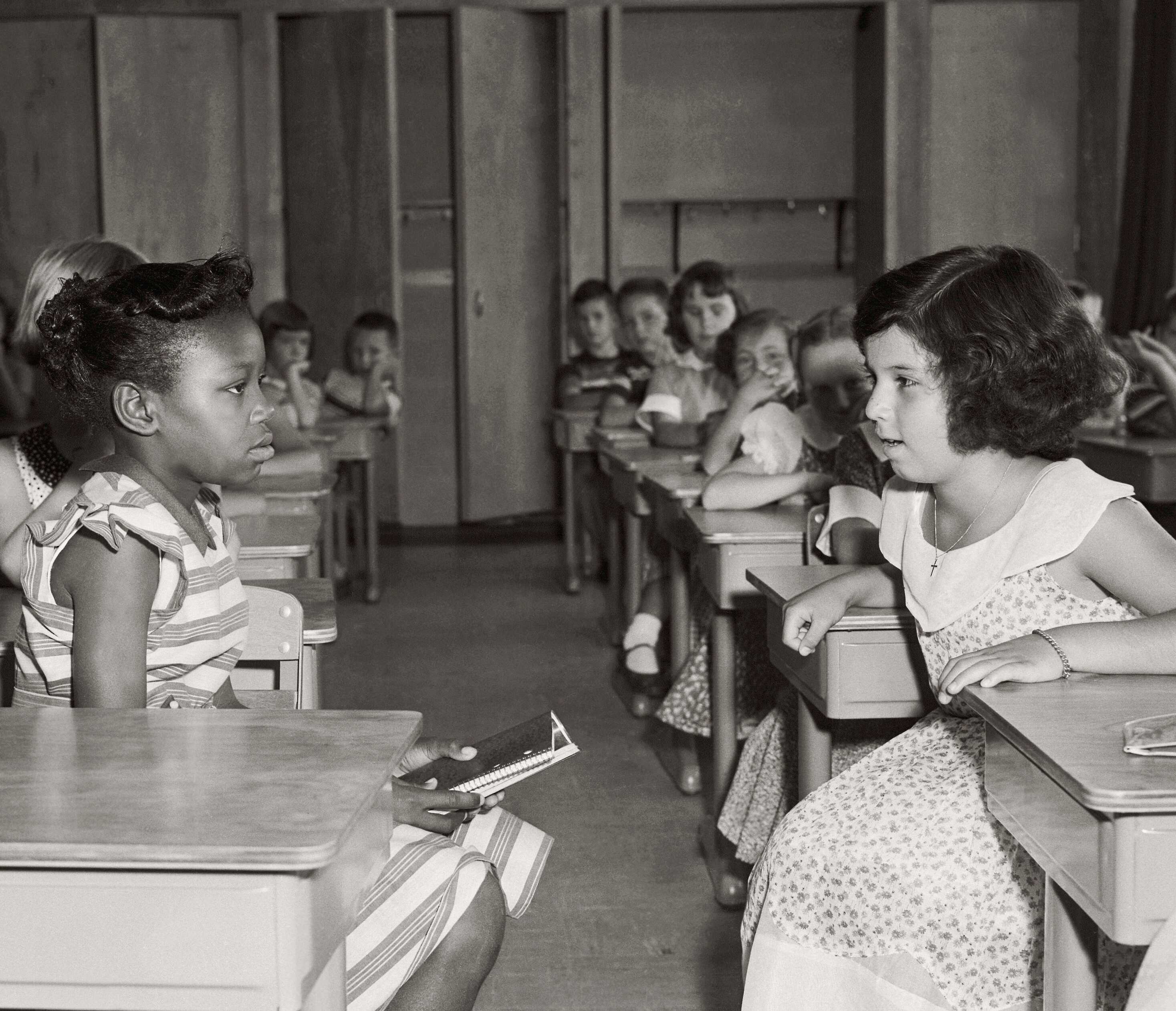 Photograph of children on the first day of desegregation