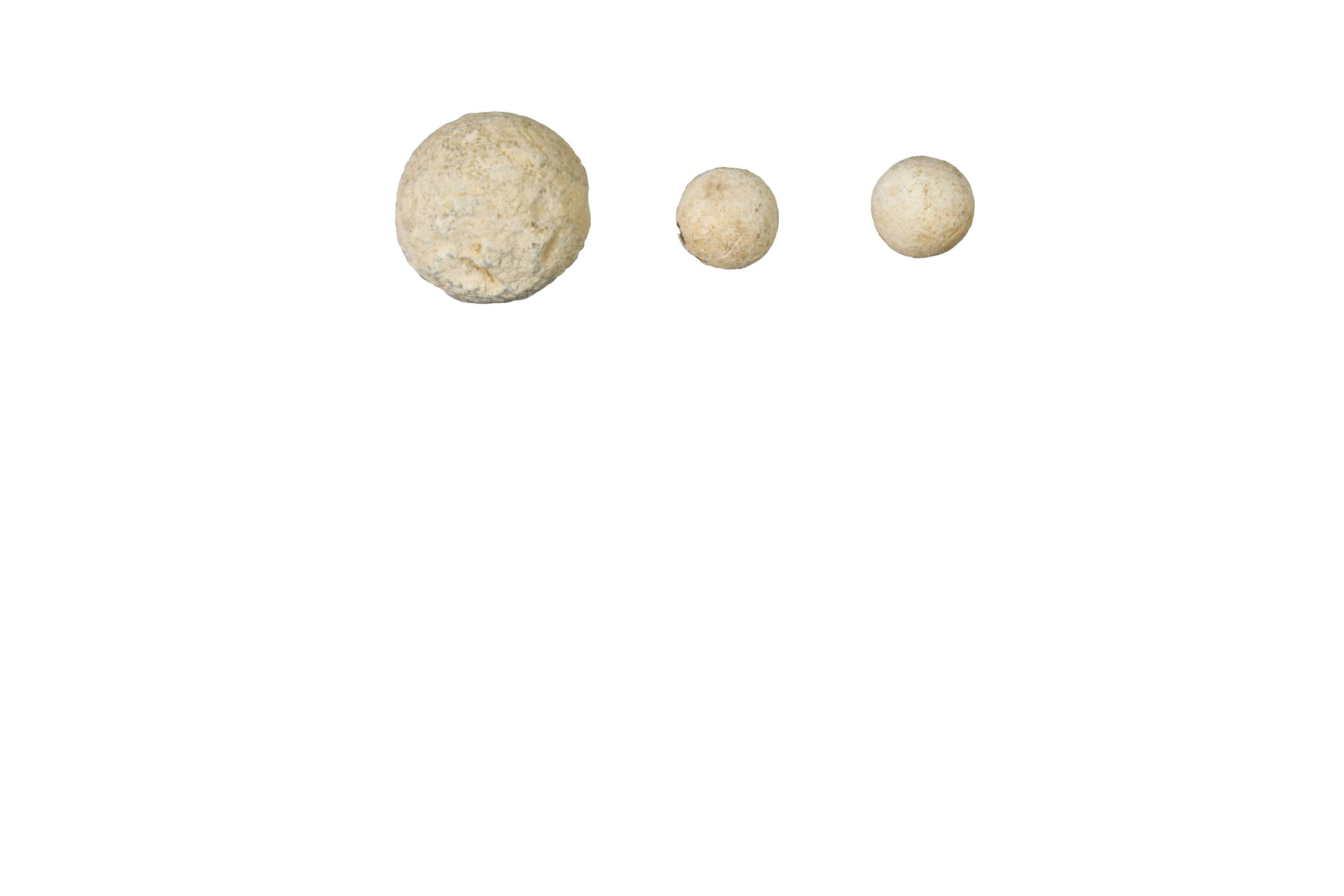 Photograph of three musket balls