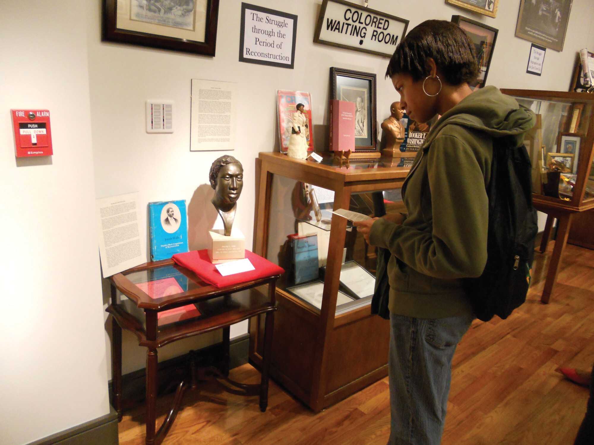 Photograph of student browsing library