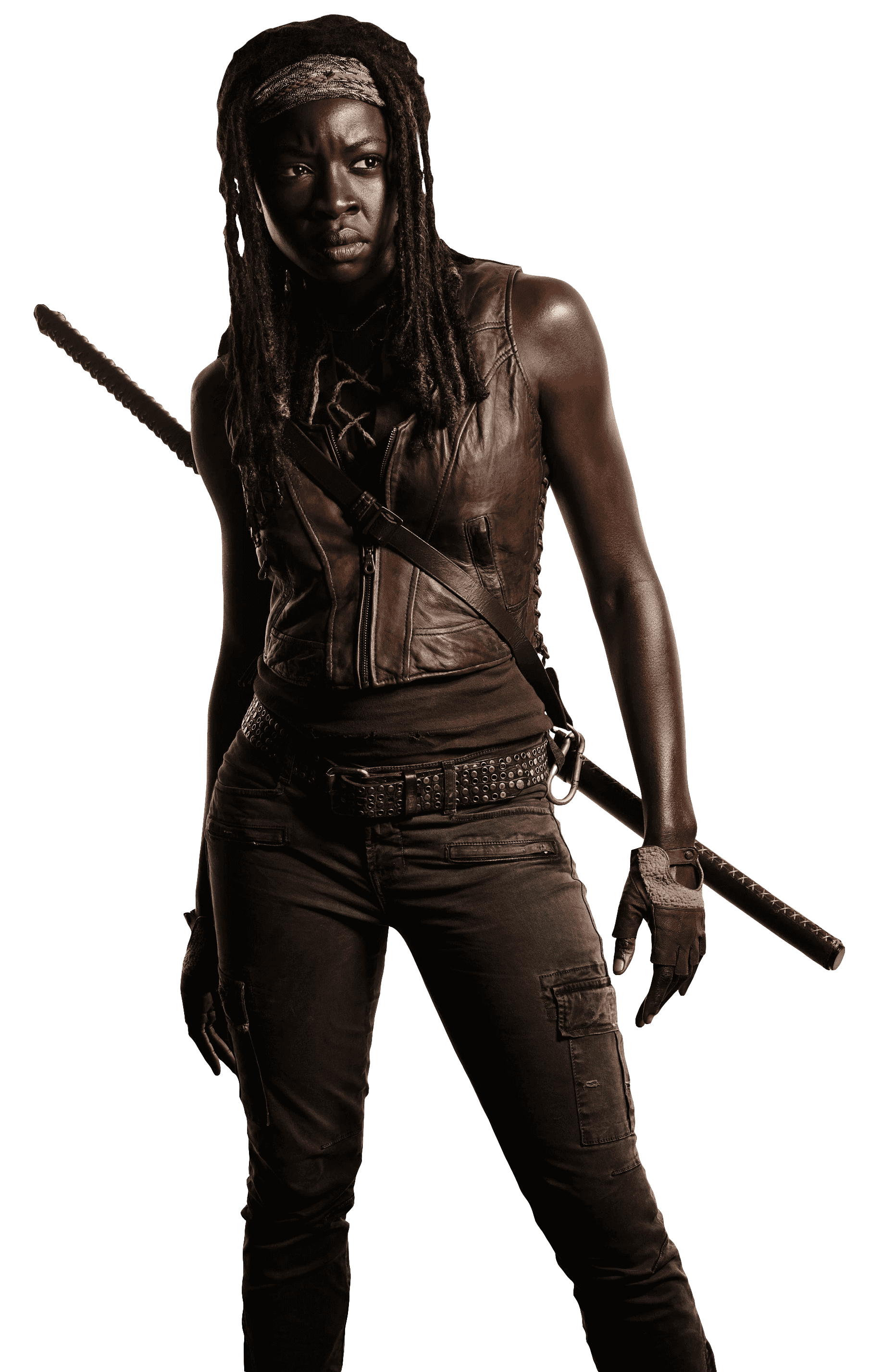 Danai Gurira plays as Michonne in the Walking Dead. She is wearing all brown with a fierce look on her face.