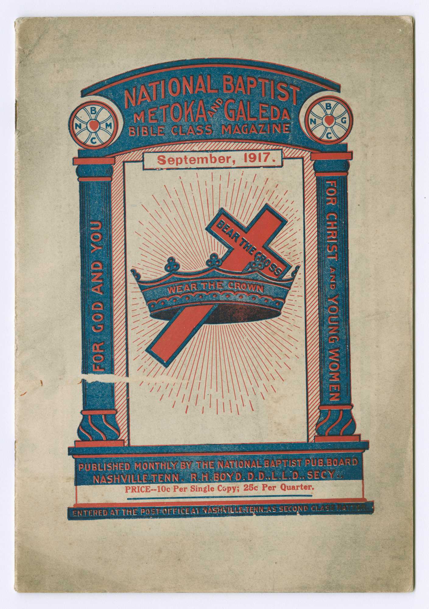 A magazine printed in red and blue ink on white paper. The front of the magazine has a cross within a crown at center.