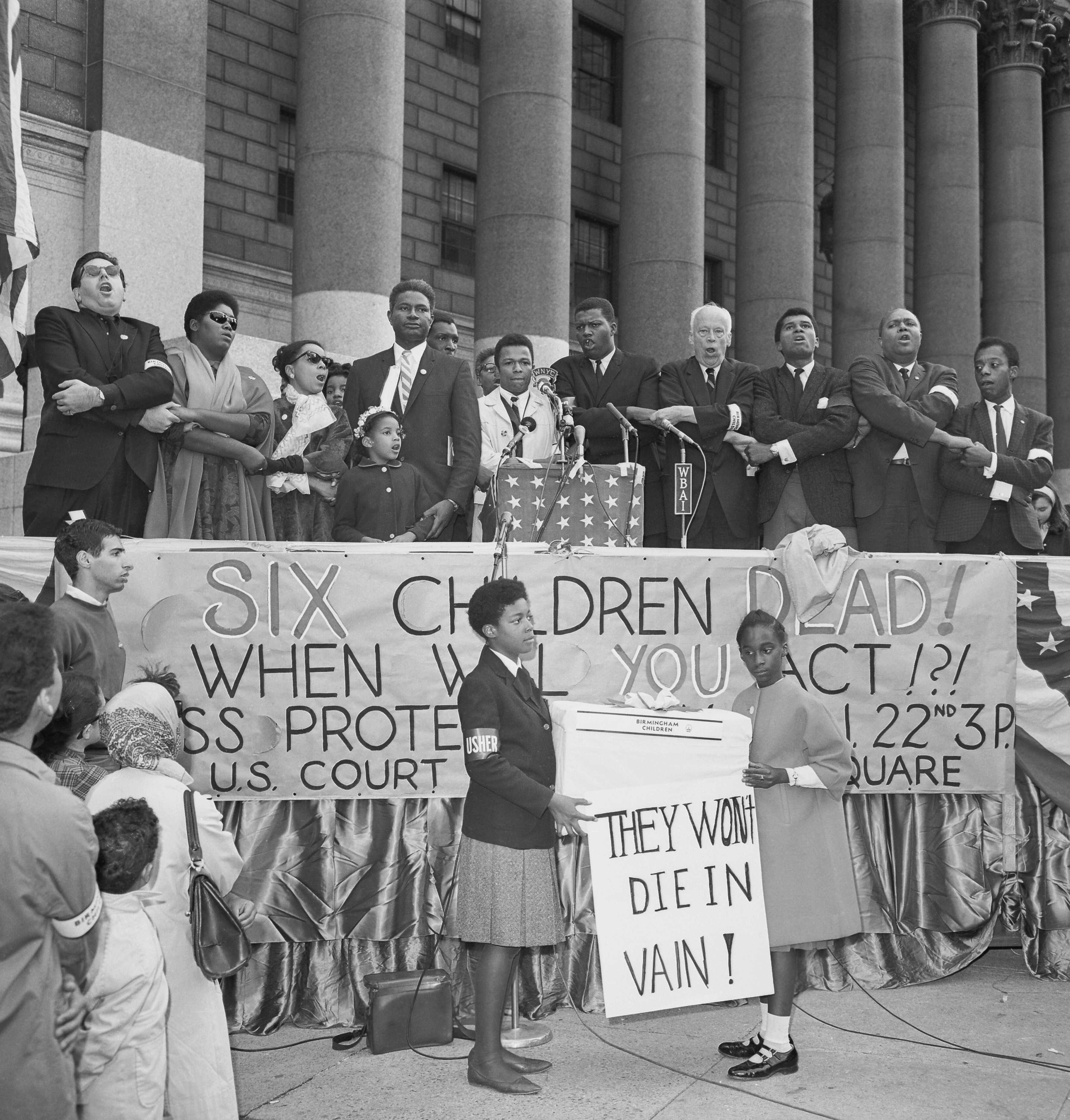 Photograph of James Baldwin at a rally in New York City