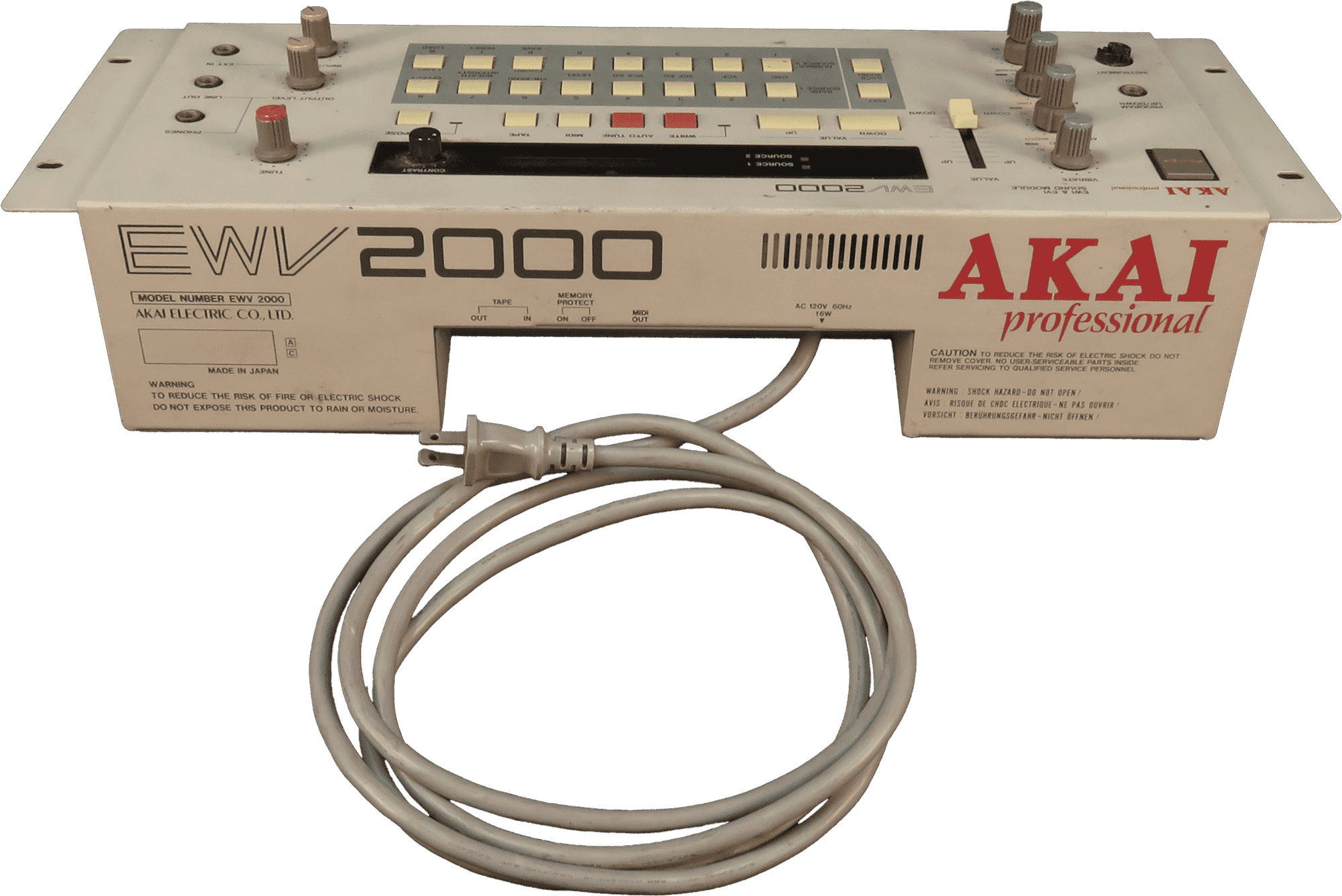 The synthesizer is beige and boxy structure with gears and buttons. It has a cord running from the back.