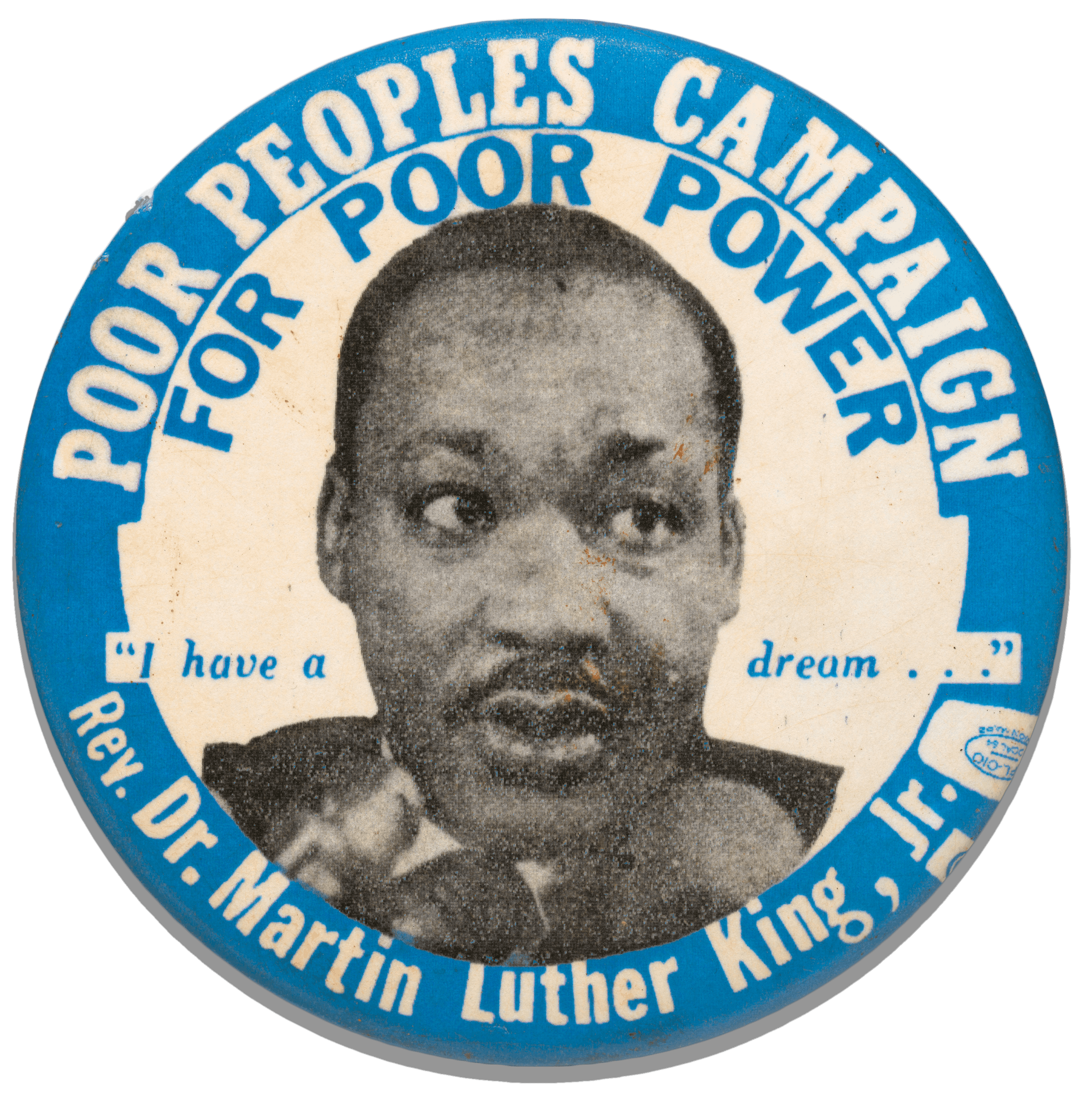 A pin with Martin Luther King's face and the Poor Peoples Campaign title