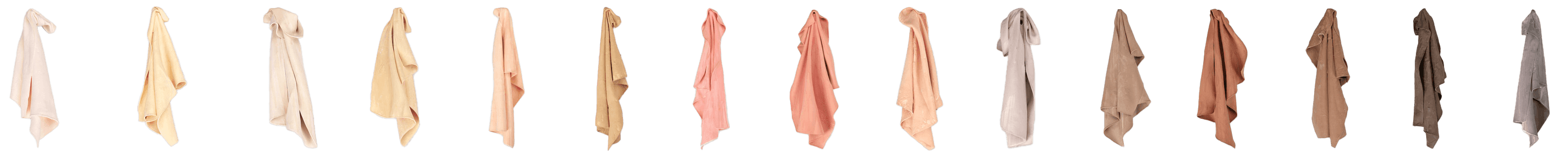 A row of hanging fabric samples in various shades, illustrating a range of colors and textures for design selection.