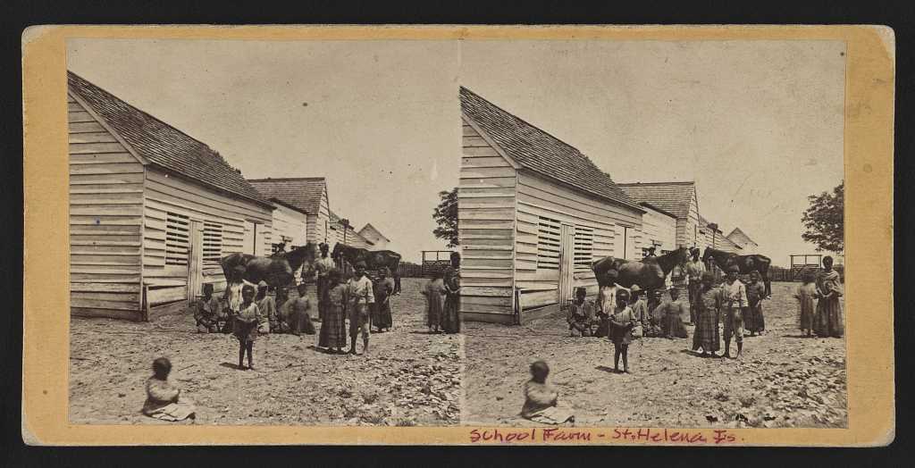 Photograph of enslaved persons with children