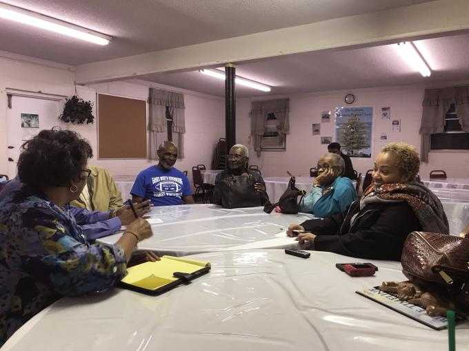 Photograph of Mary Elliott meeting with Africatown Community