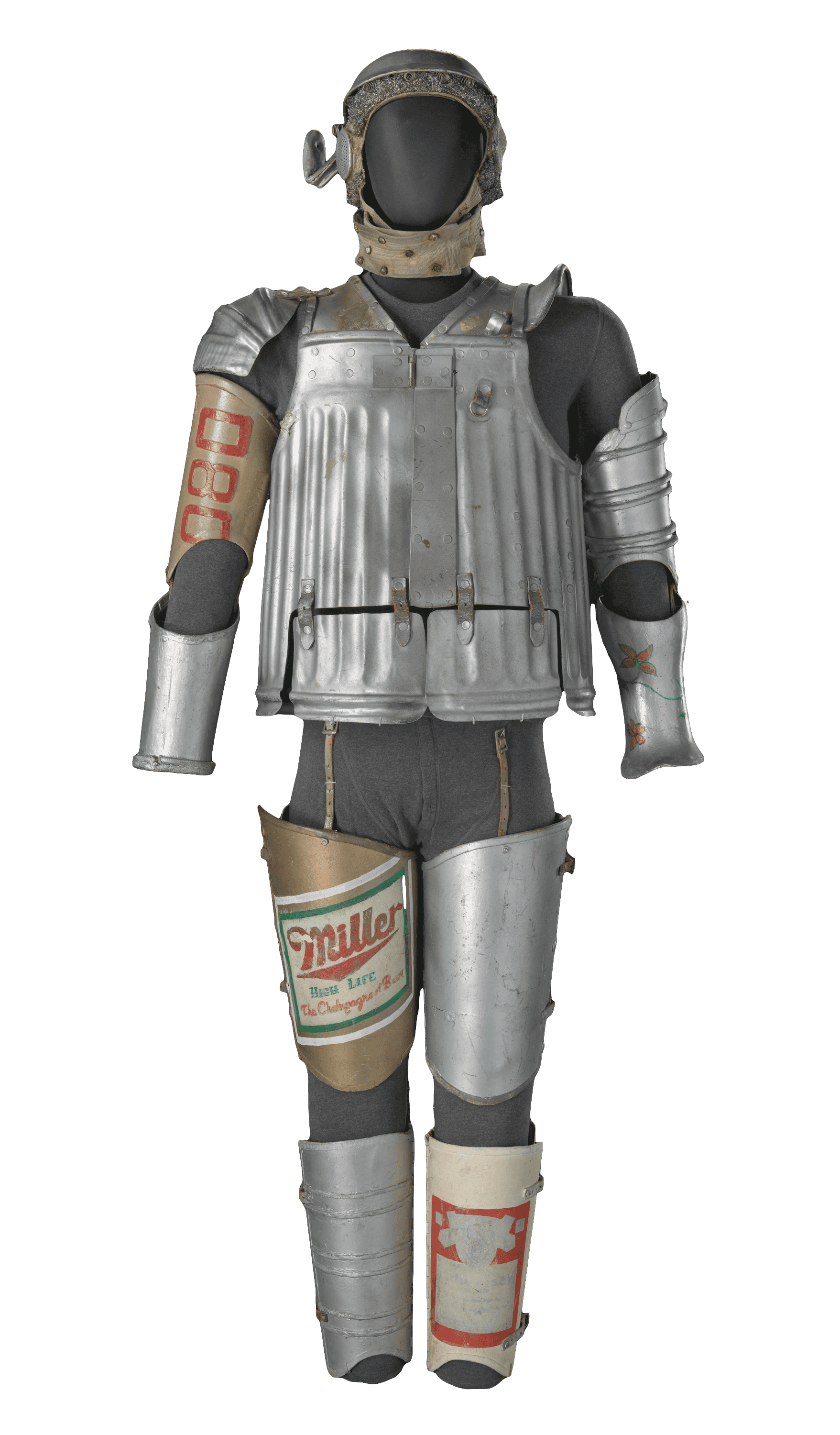 The costume for Tin Man in The Wiz on Broadway is mad of collage looking meta to create a full body suit and helmet.