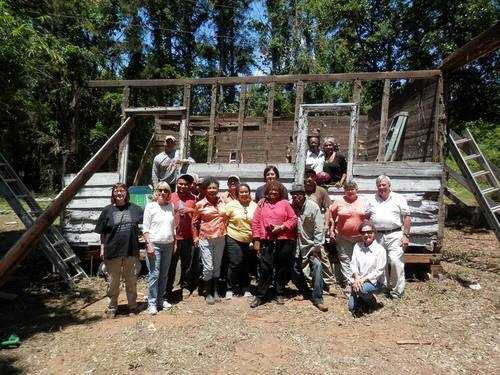 Photograph of group onsite to dismantle the cabin