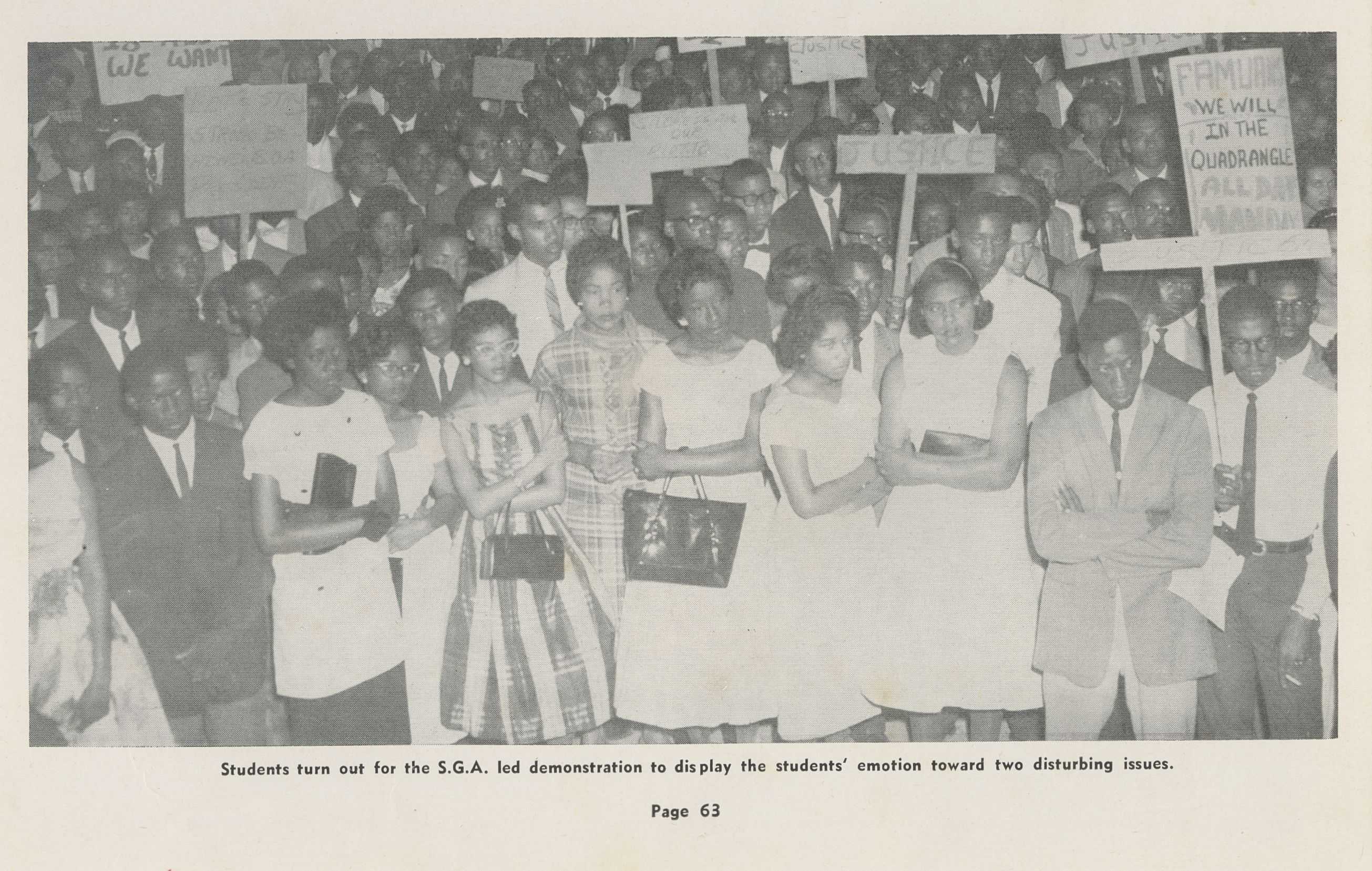 Newspaper clipping showing students protesting with signs.