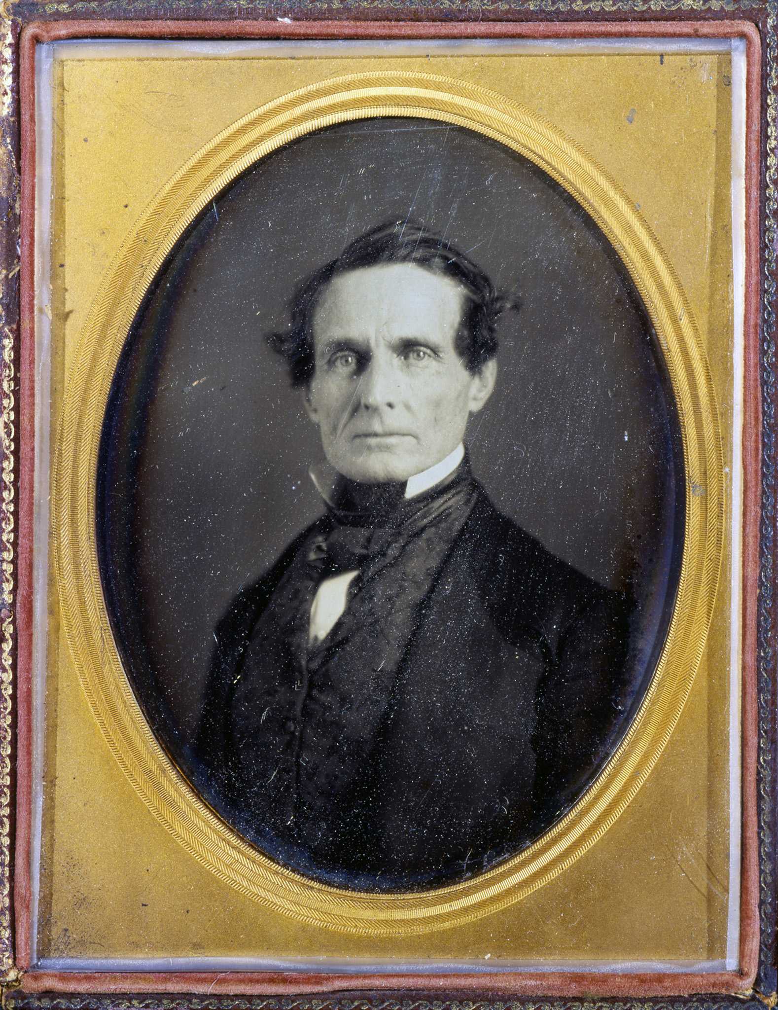 Daguerreotype image of Jefferson Davis in a gold and brown frame