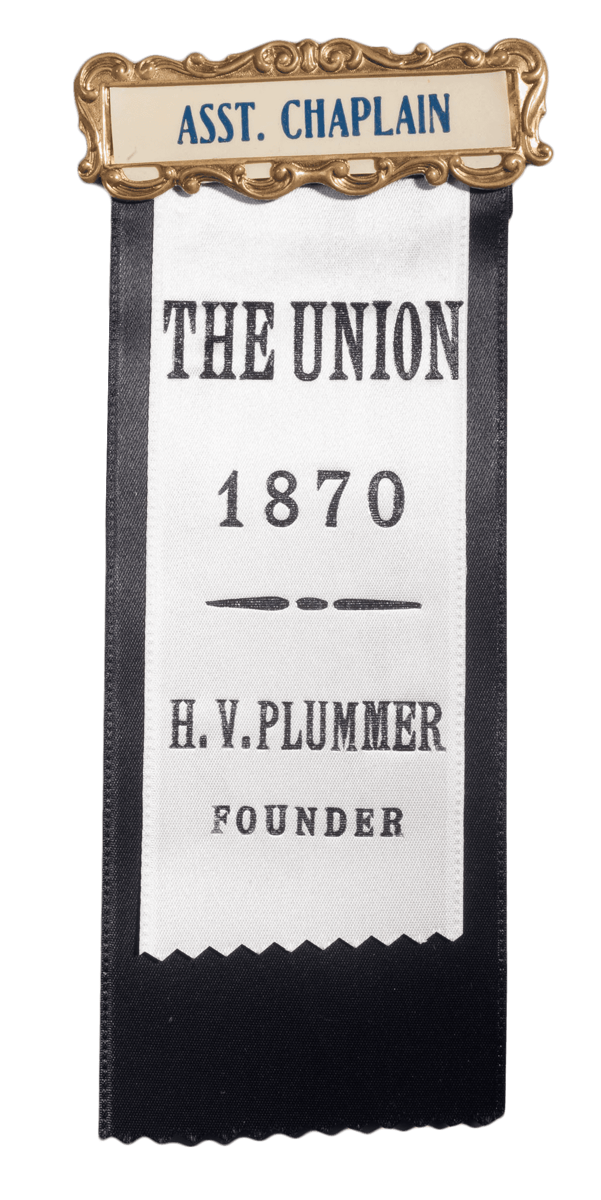 Black and white ribbon badge with gold decorative name tag for "Asst. Chaplain "  The white ribbon is imprinted with "The Union   1870   H.V. Plummer Founder"