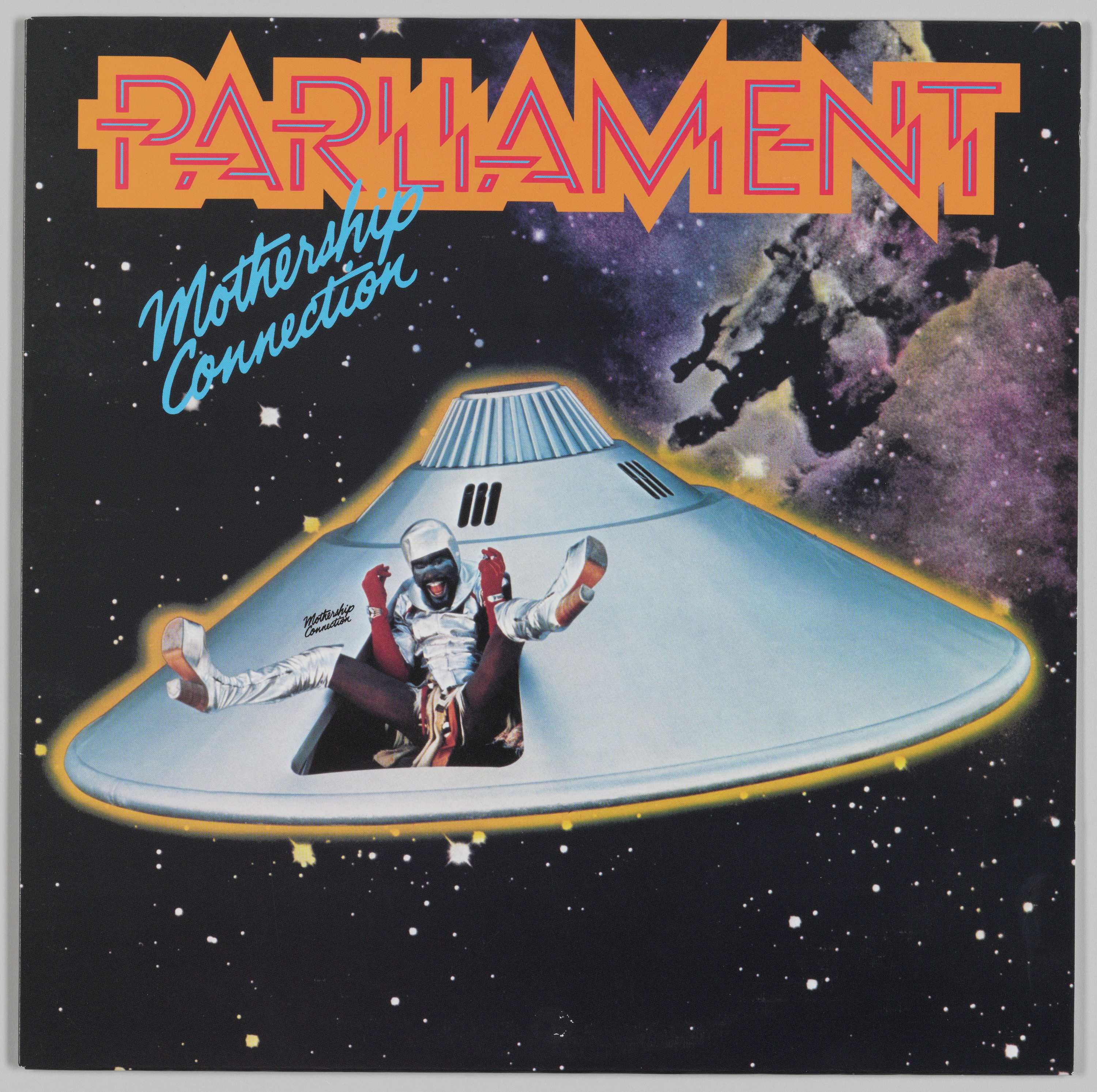 At the top of the cover, Parliament is in yellow and pink font over a galaxy, above a UFO space ship.