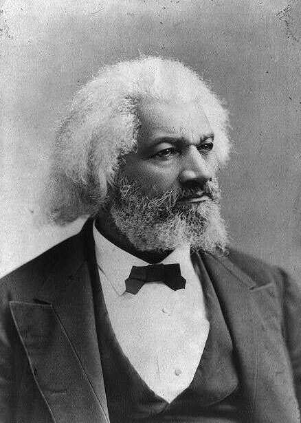 Black and white photographic portrait of Frederick Douglas.