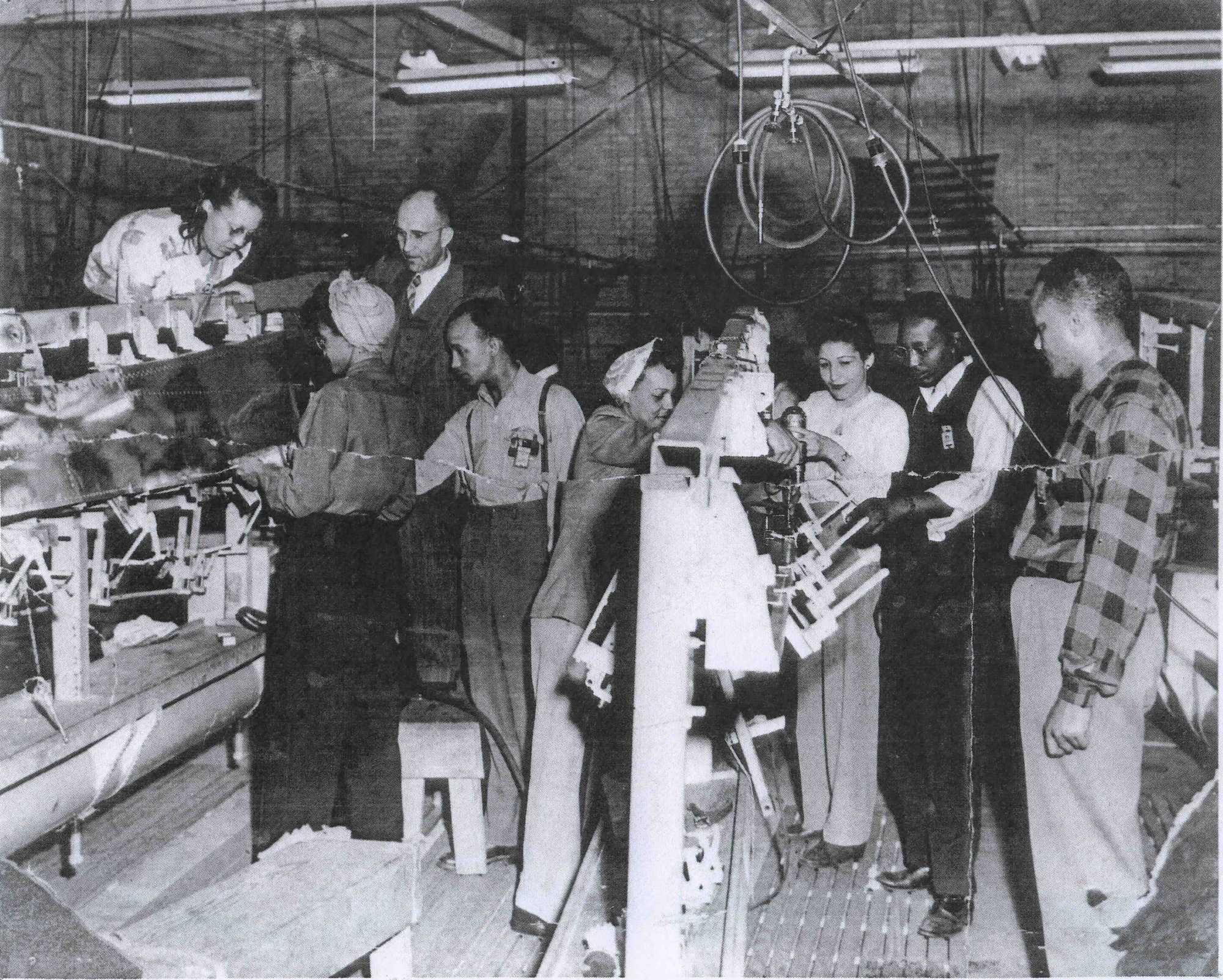 Photograph of Workers building panels for Douglas A-26 Invader aircraft