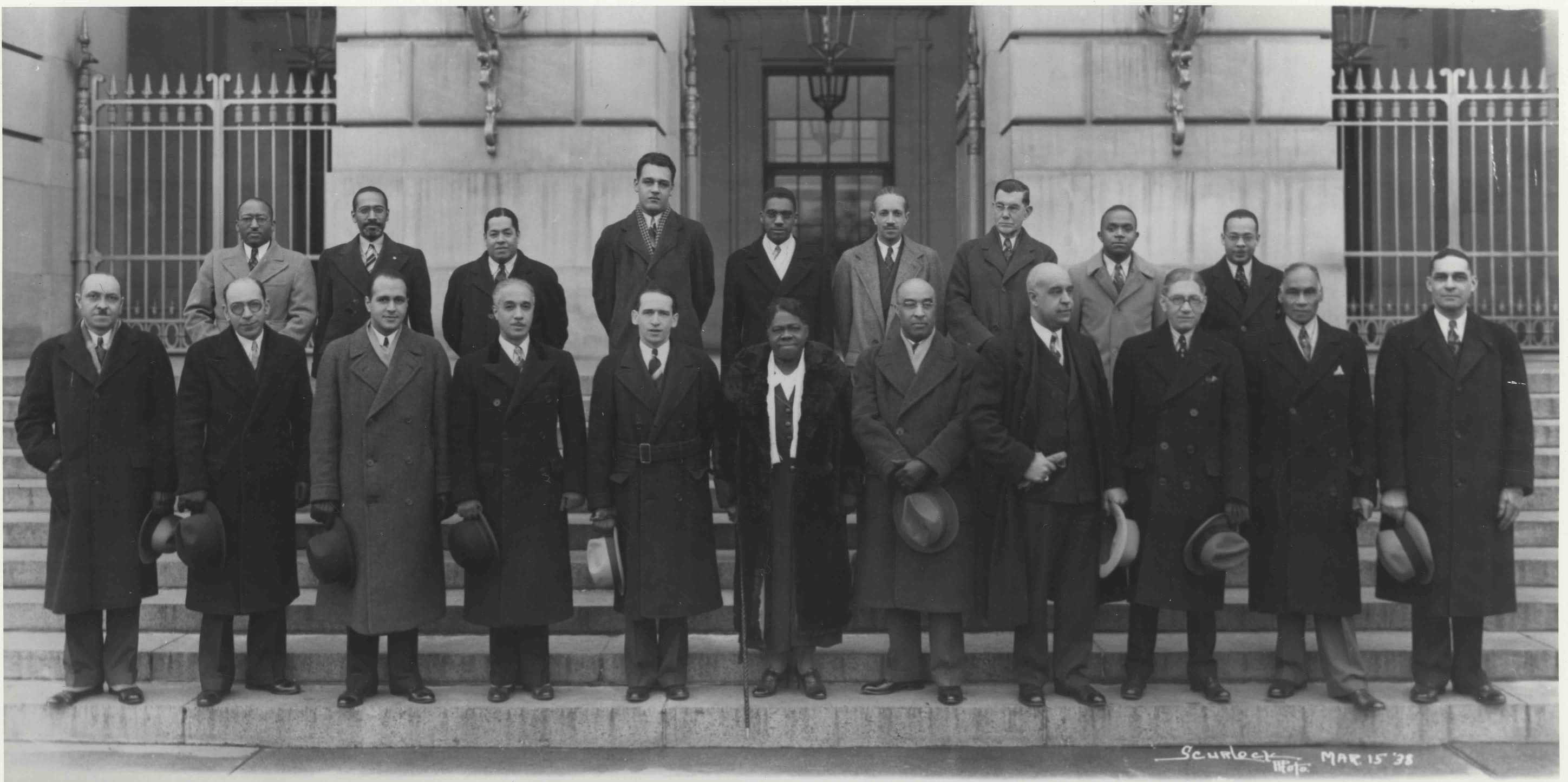 Photograph of Mary McLeod Bethune (center) and other members of the Federal Council on Negro Affairs