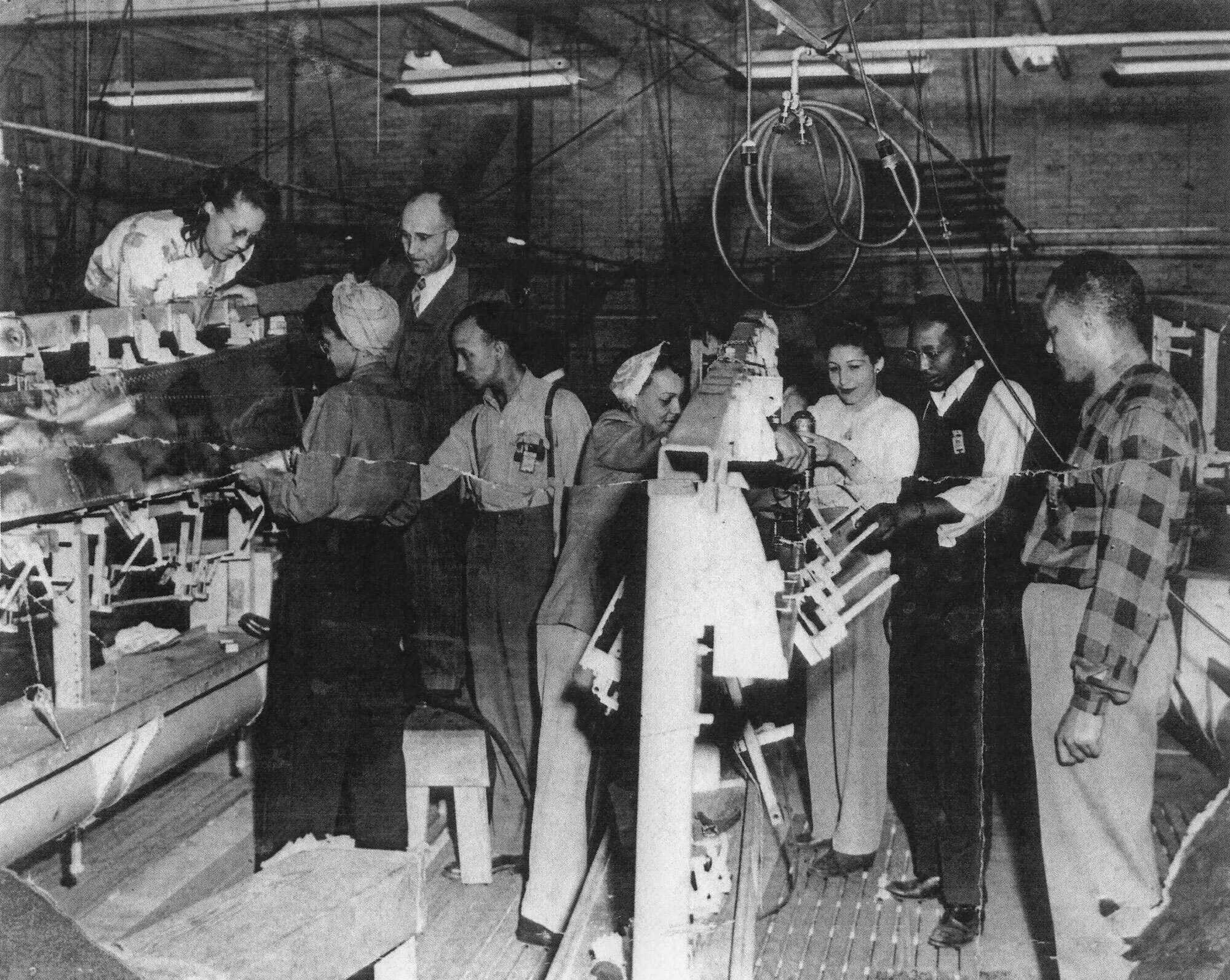 Photograph of Workers building panels for Douglas A-26 Invader aircraft