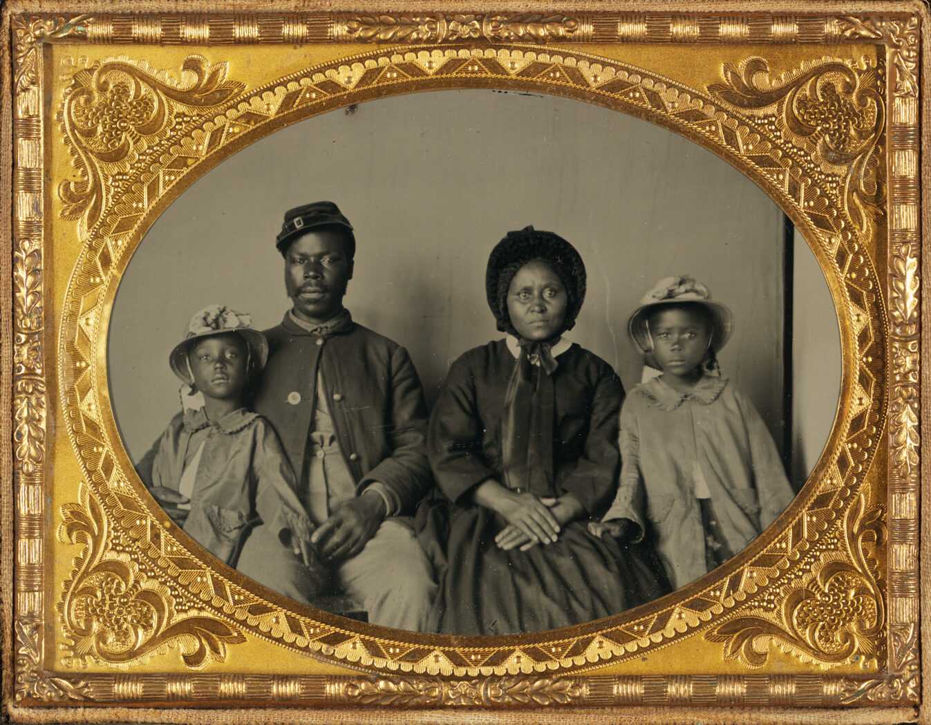 Photograph of Unidentified African American Soldier with His Family