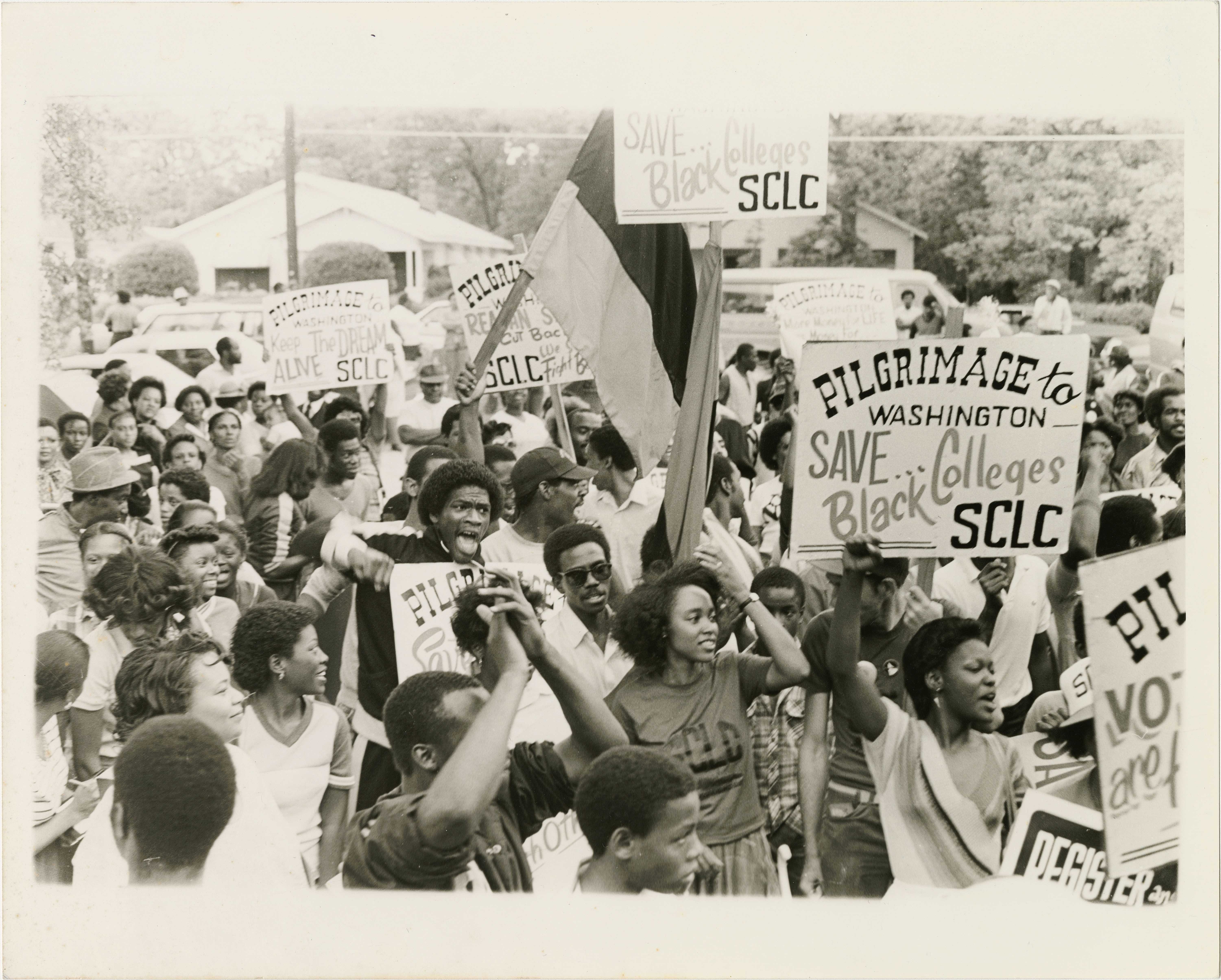 Black and white photograph of students protesting to save black colleges and universities.