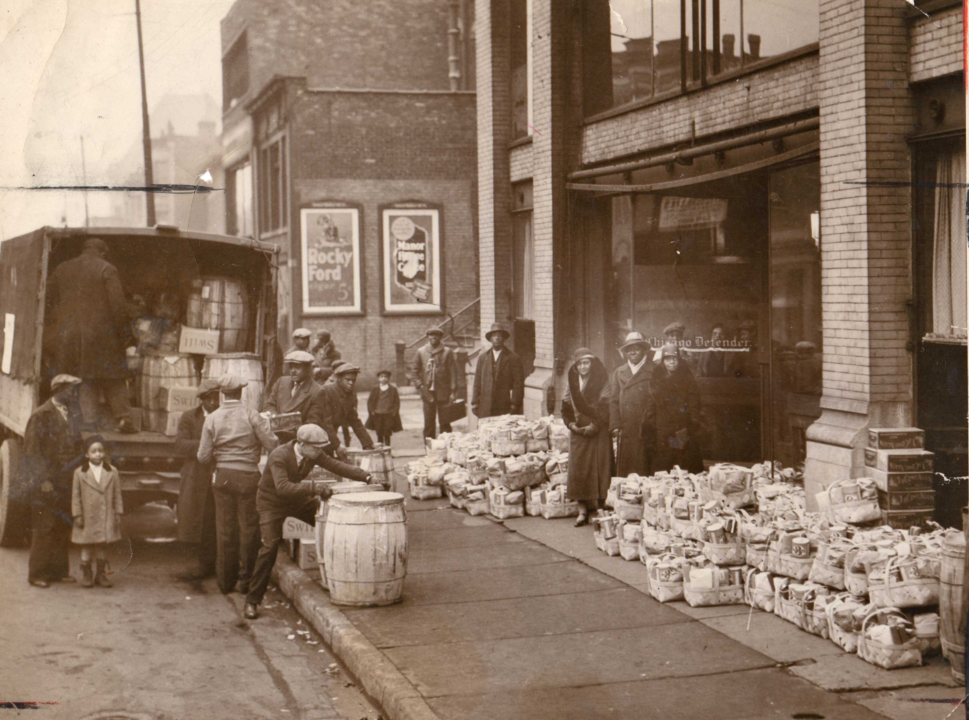 Photograph of truck outside a building