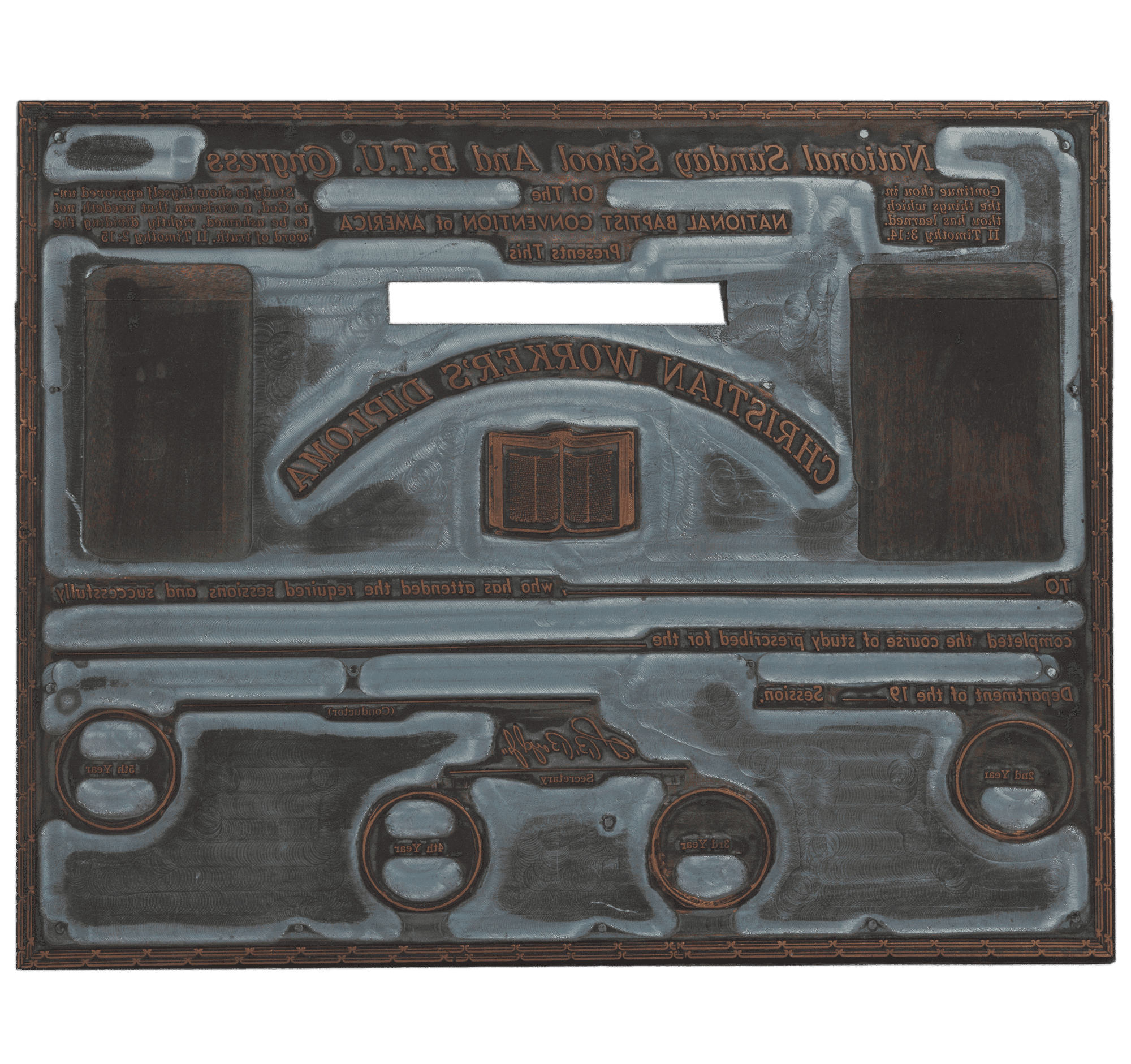 Printing plate for a diploma mounted on wood.