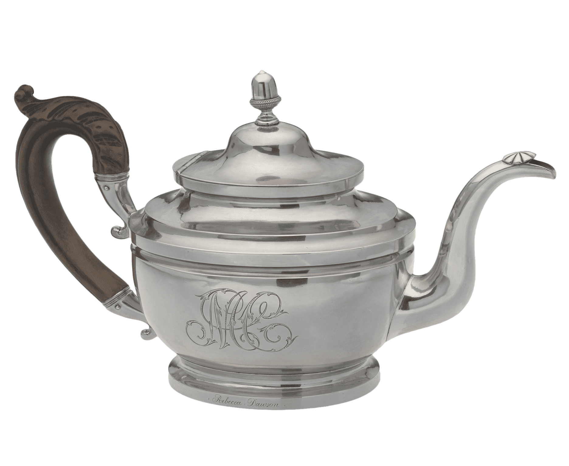 The silver teapot has an oval vase-shape on a spreading pedestal foot, with curved spout capped by an incised patera and wooden leaf-capped scroll handle, and hinged domed cover with acorn finial. The scripted monogram "MC" has been engraved on the side and the name "Rebecca Dawson" has been engraved along the bottom rim.