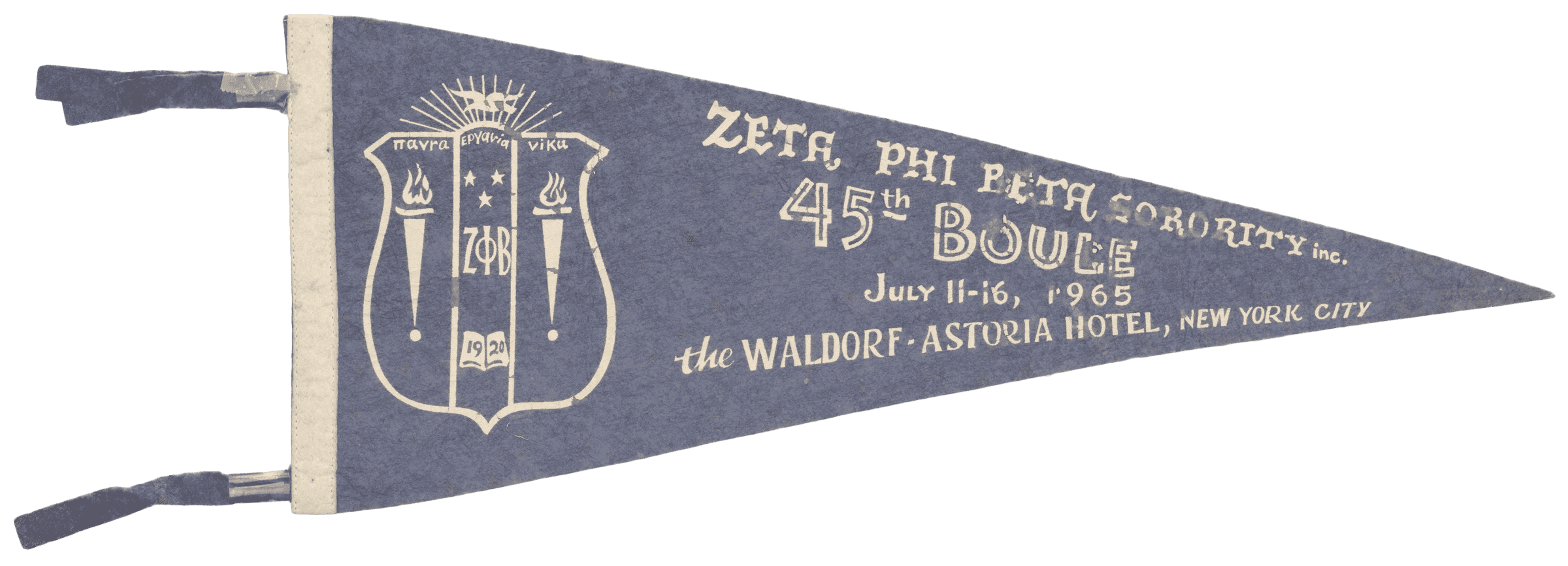 A Zeta Phi Beta Sorority felt pennant. This triangular shaped pennant is a faded royal blue on the front.