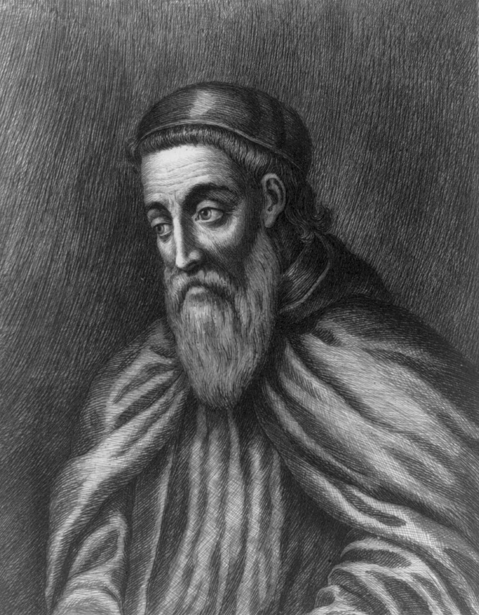 A drawing of Amerigo Vespucci. Vespucci has a long beard and is wearing a cloke.