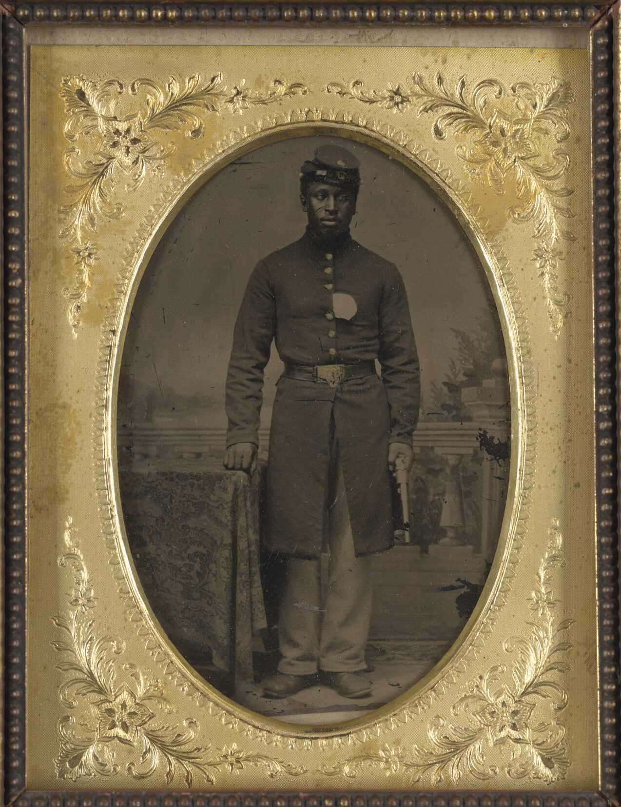 Photo image of Sergeant Tom Strawn in a gold and wood frame