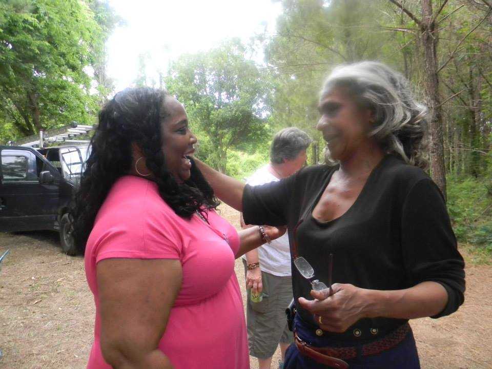 Photograph of NMAAHC staff member Fleur Paysour greeting descendant Arlene Estevez