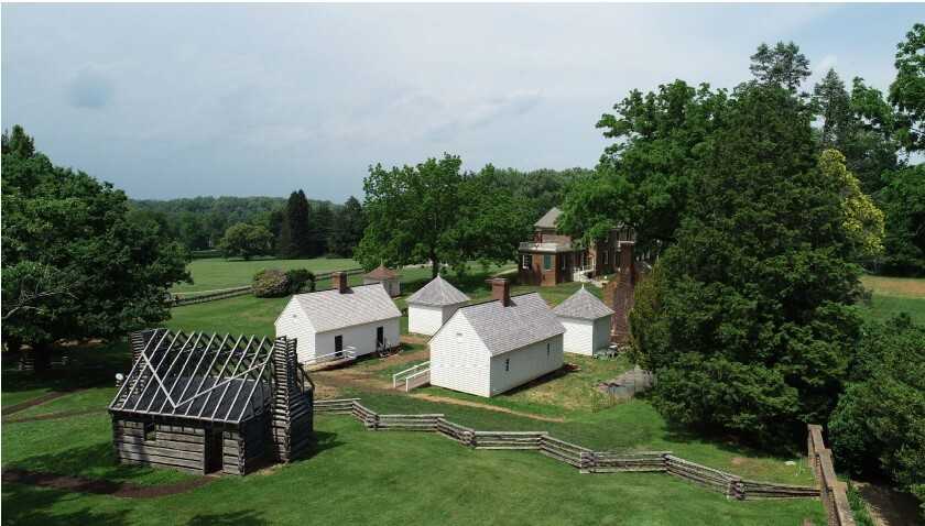 Aerial view of small houses in a cluster.