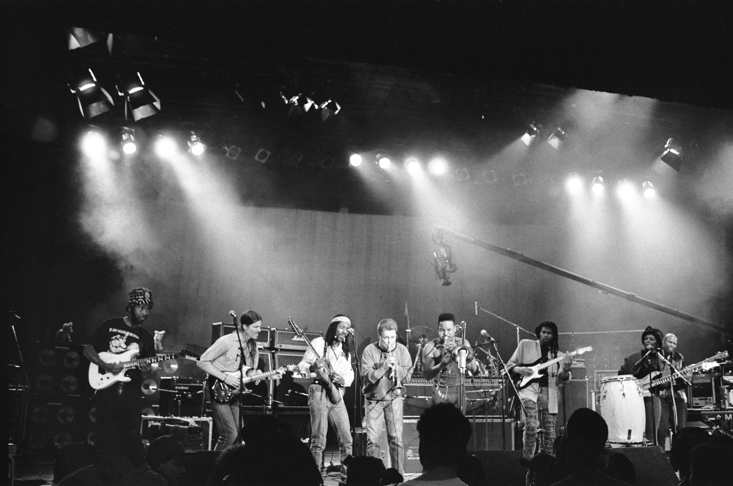 Black Rock Coalition members performing on stage in this black and white photograph.